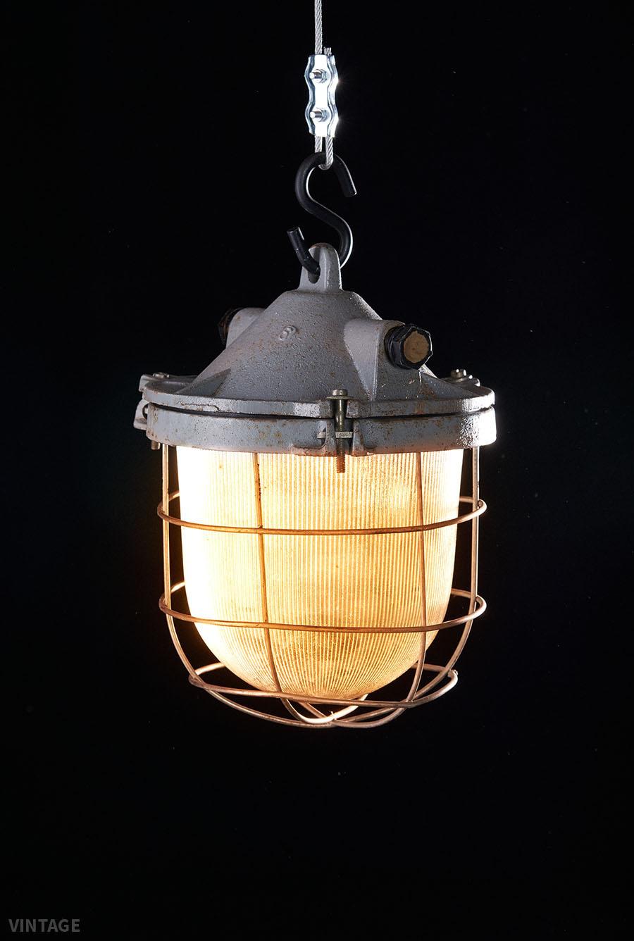Primary Use
Hanging cast iron lamp OKS-1 used to illuminate factory and workshop spaces, where there was dustiness and a chance for a mechanical damage.

Manufacturer: Lighting Equipment Factory ZAOS in Wilkasy near Gizycko
Time period:
