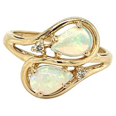 1970s Opal and Diamond Bypass Ring in 14k Yellow Gold