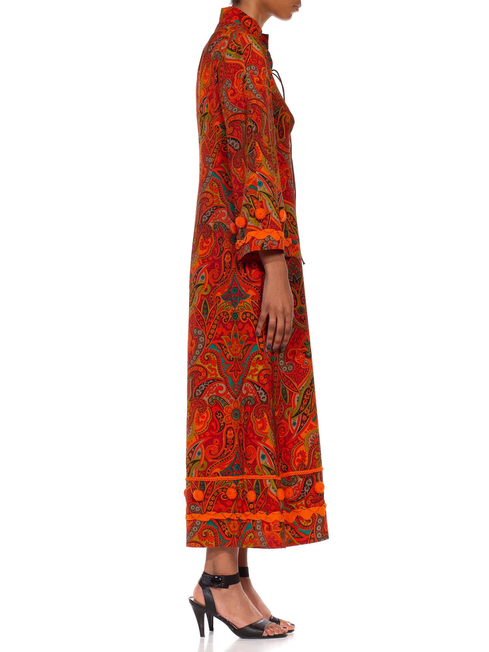 1970S Orange Polyester Lace Up Paisley Kaftan With Pom And Ribbon Trim In Excellent Condition In New York, NY