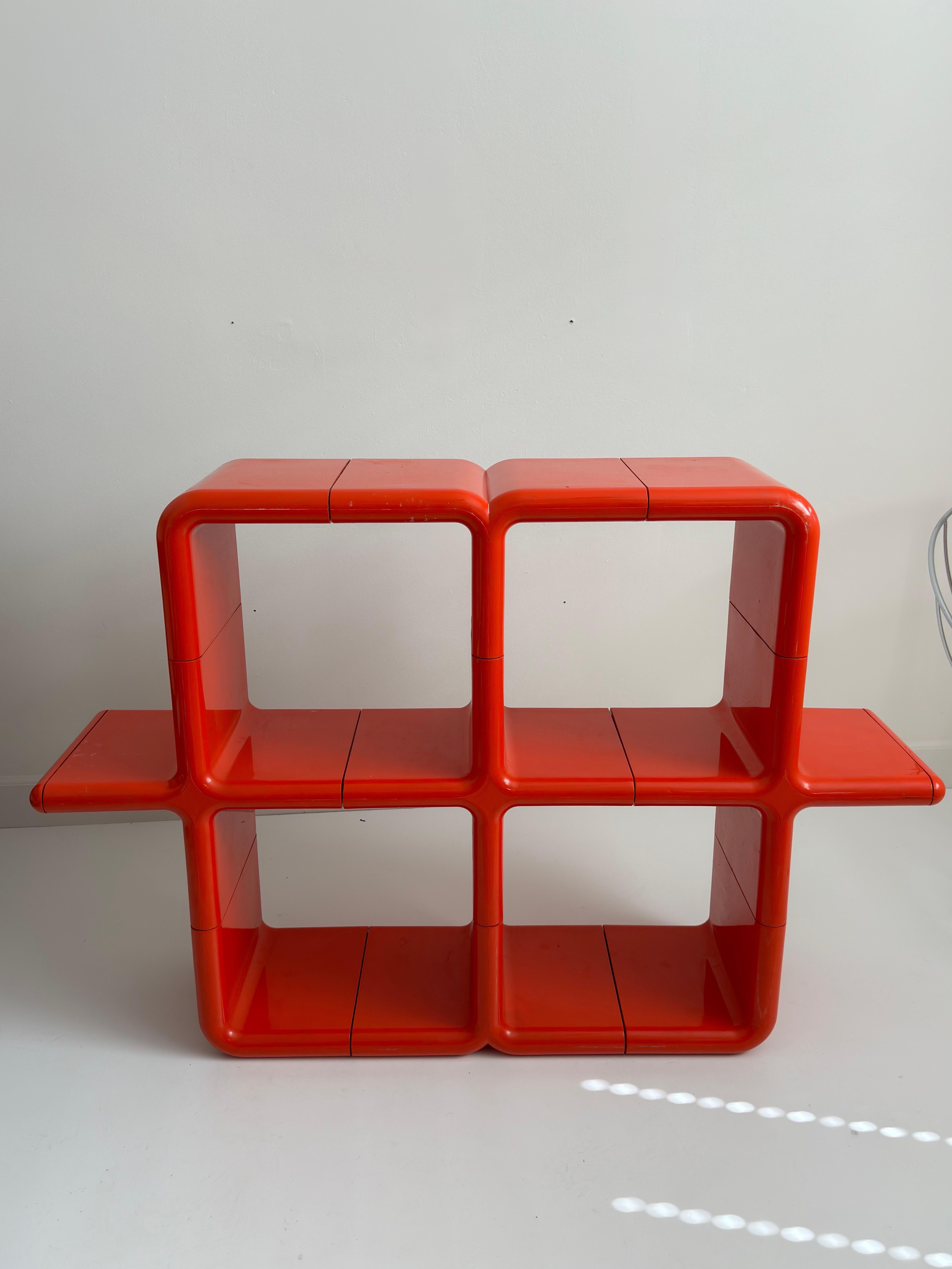 Orange Umbo modular shelving system designed by Kay Leroy Ruggles for Directional, 1970’s. in excellent vintage condition.