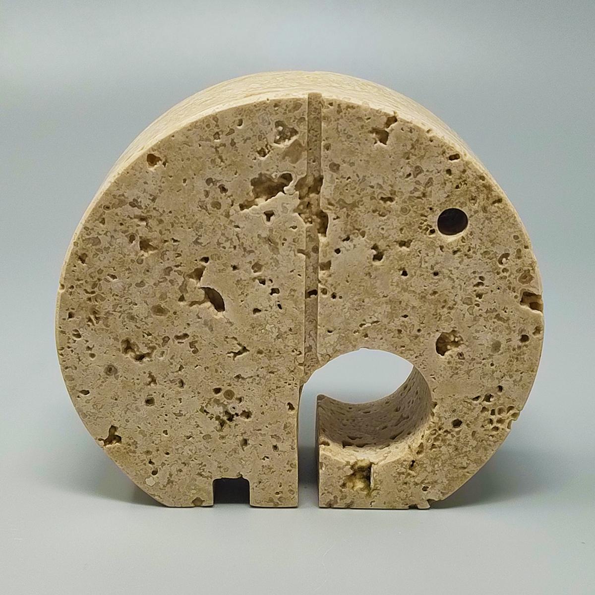 1970s Original  travertine elephant sculpture by Enzo Mari for F.lli Mannelli. The item is in excellent condition. Made in Italy.
Dimension:
4,33  x 1,18  x 3,93 H inches
L 11 cm x P 3 cm x  cm 10 

.