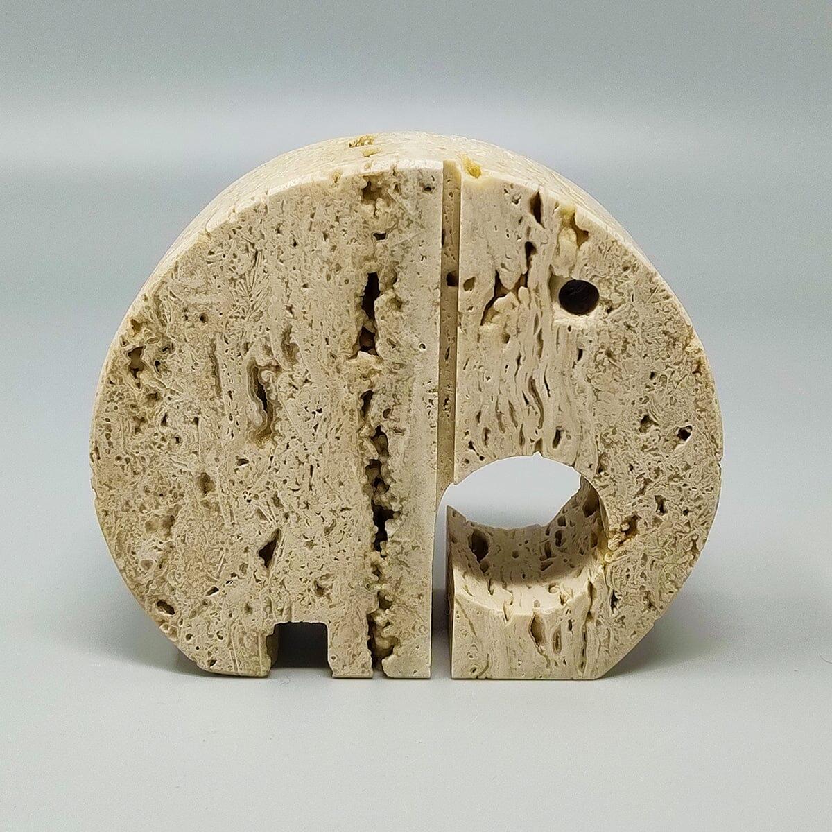 1970s Original  travertine elephant sculpture by Enzo Mari for F.lli Mannelli. The item is in excellent condition. Made in Italy.
Dimension:
4,33  x 1,18  x 3,93 H inches
L 11 cm x P 3 cm x  cm 10 

.