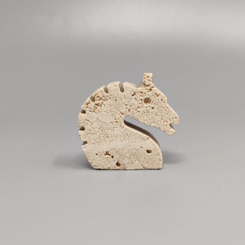 1970s Original travertine horse sculpture by F.lli Mannelli.
The item is in excellent condition. Made in Italy.
Dimension:
1,77 w x 0,39 D x 1,57 H inches
L 4,5 cm x P 1 cm x cm 4 H.