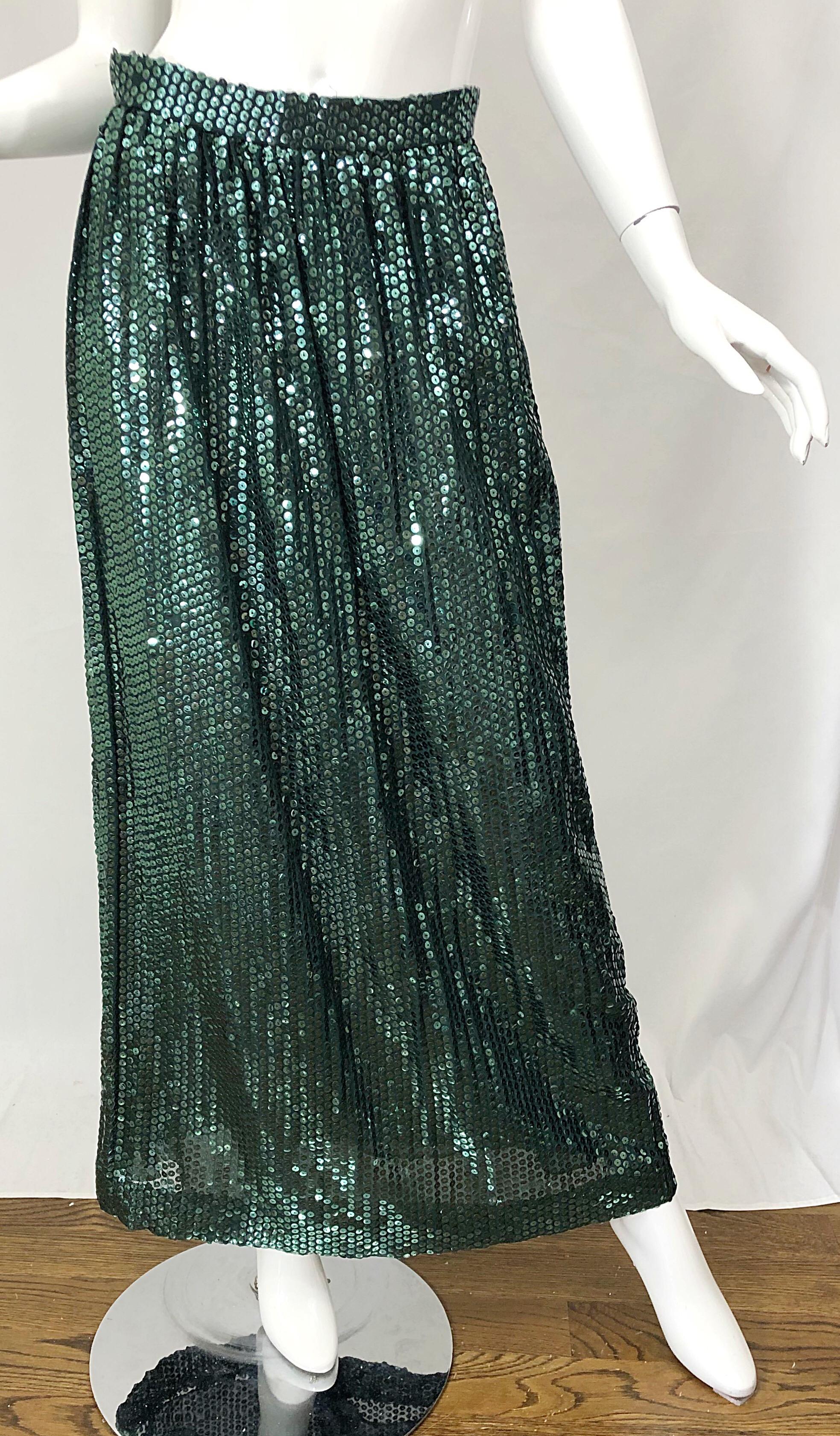 Beautiful 1970s vintage OSCAR DE LA RENTA hunter green silk chiffon fully sequined maxi skirt! Features thousands of hand-sewn hunter / forest green metallic sequins throughout the entire skirt. Two layers of the finest silk chiffon. Hidden metal