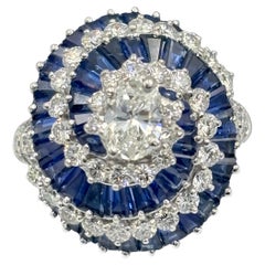 1970s Oscar Heyman platinum ballerina ring with diamonds and sapphires