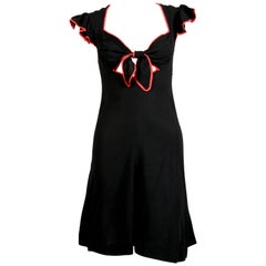 1970's OSSIE CLARK black moss crepe dress with red trim and cut out neckline