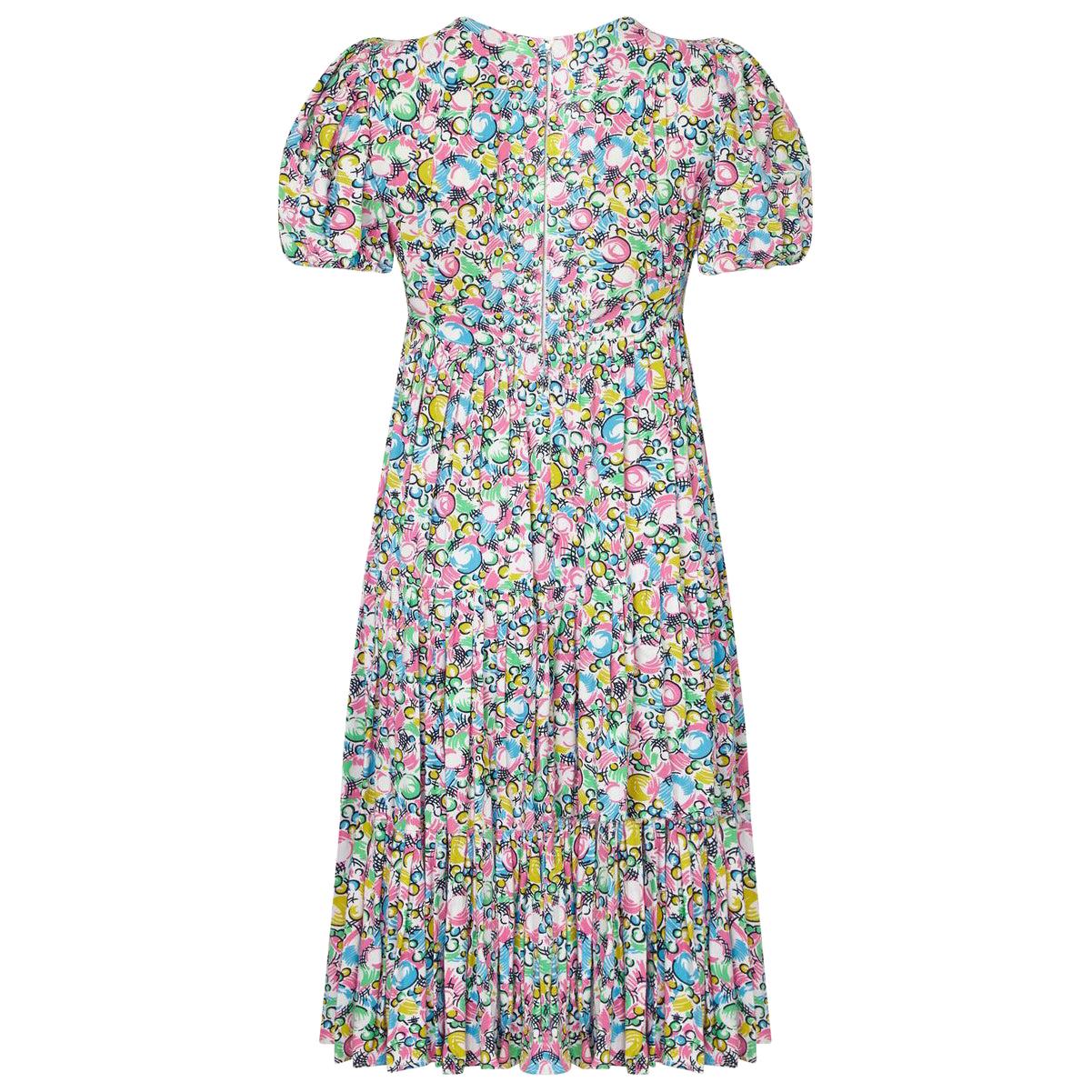 This charming circa 1969 cotton dress by Ossie Clark for Radley boasts a pretty 'bubble' print by celebrated textile designer Celia Birtwell.  This piece is pretty and gamine with puff sleeves and a wide Empire line waistband. The skirt has 3 x soft
