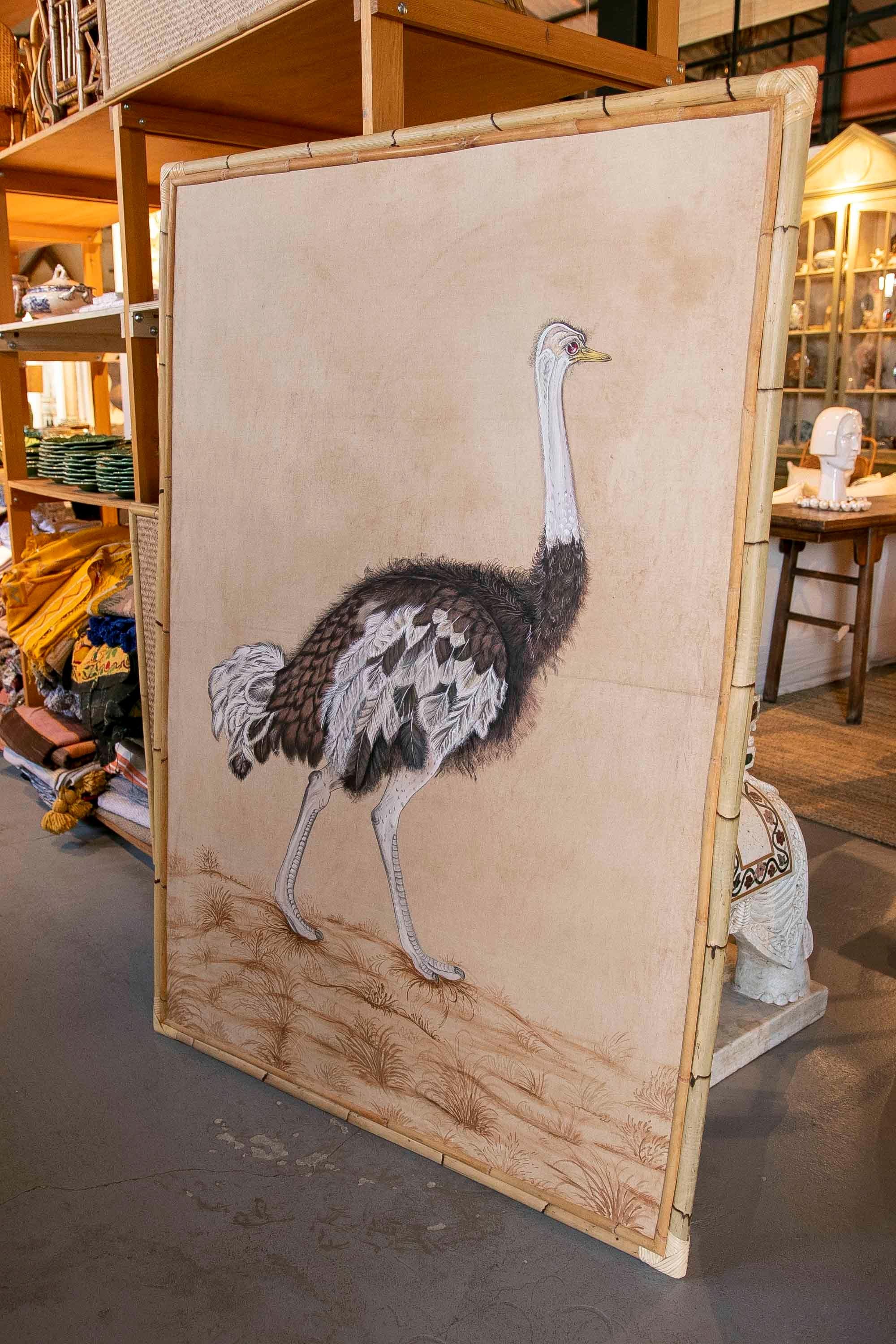 1970s Ostrich Picture Painted on Canvas and Framed in Bamboo.
