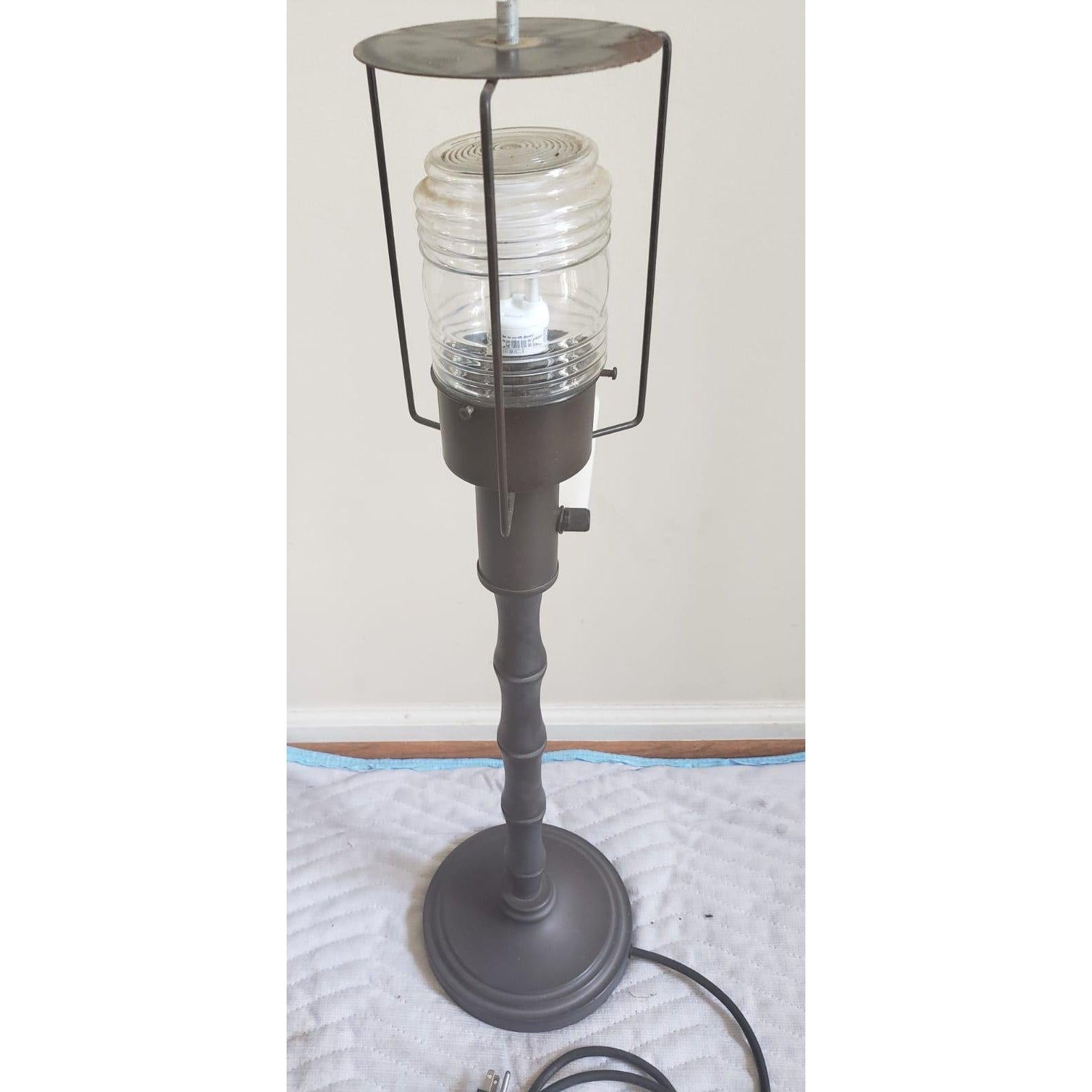 1970s outdoor faux bamboo metal lamp.
Faux Wicker shade in walnut color.
31