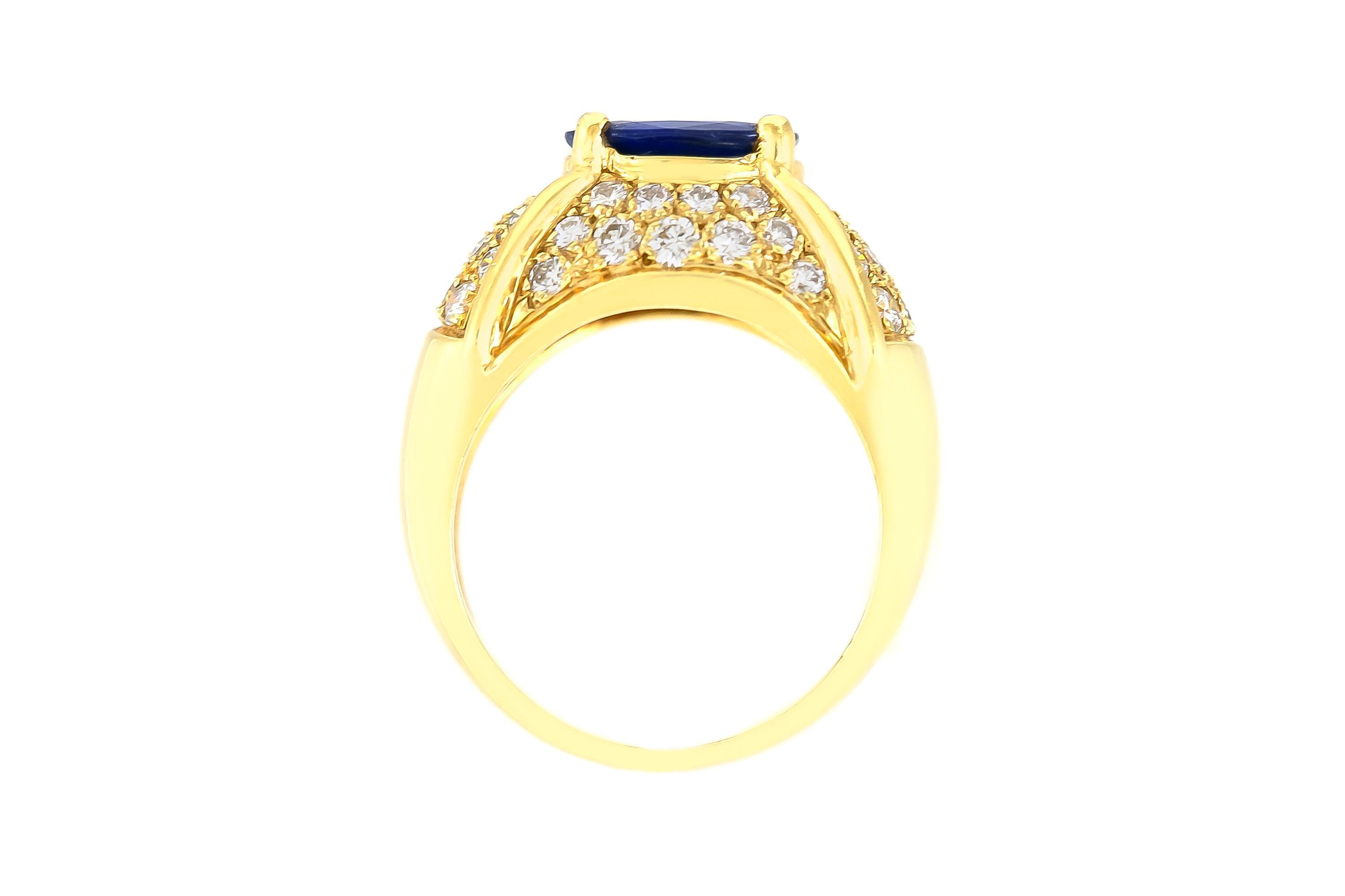 Oval Cut 1970s Oval Sapphire with Diamonds on 14 Karat Yellow Gold Setting For Sale