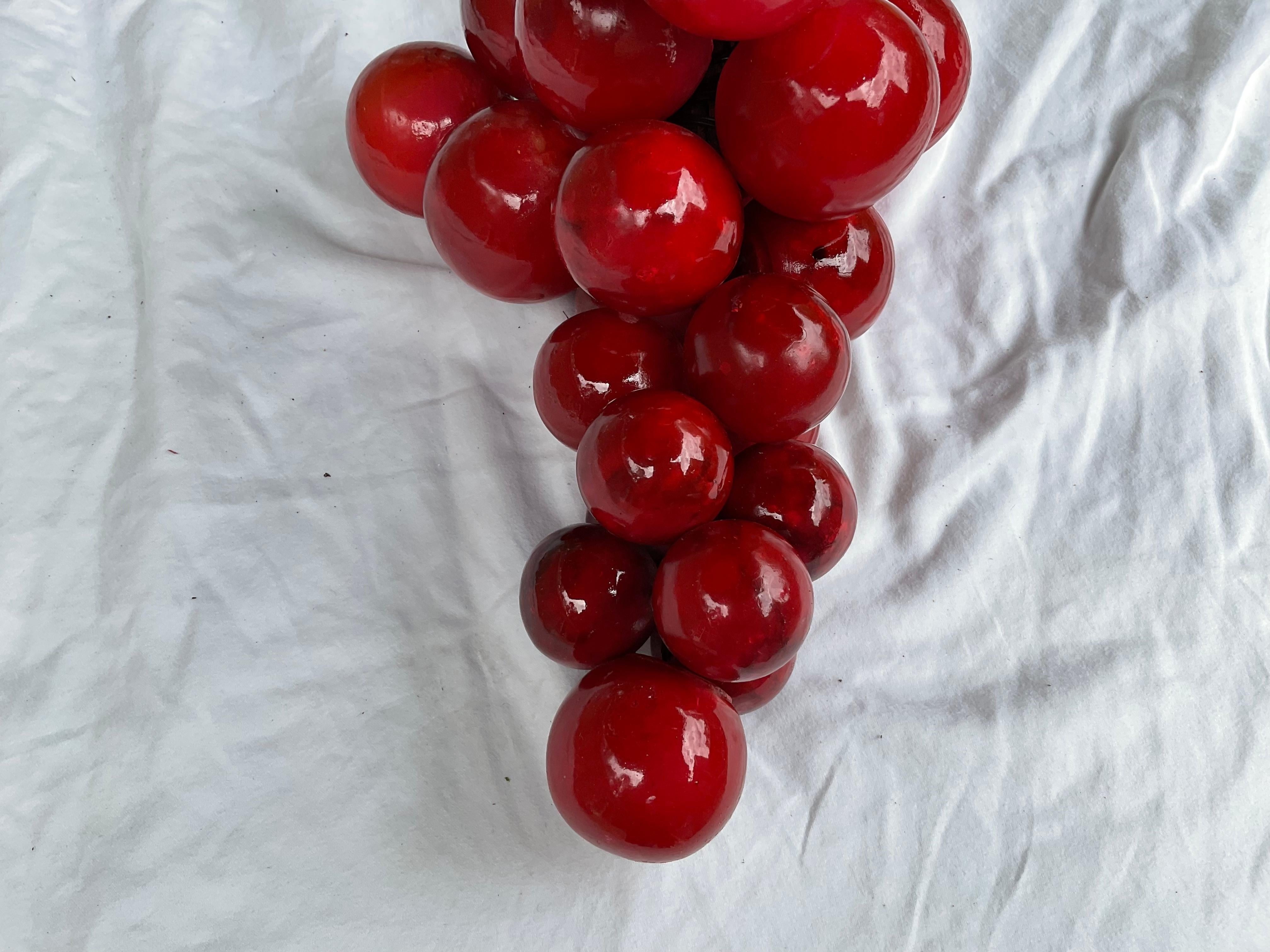 I have bought, collected, and sold vintage stone fruit for years. I love it and I know there are still people out there, that still buy it! Me! This is a very large cluster, of stone grapes, in a luscious red color, that I have never seen before. At
