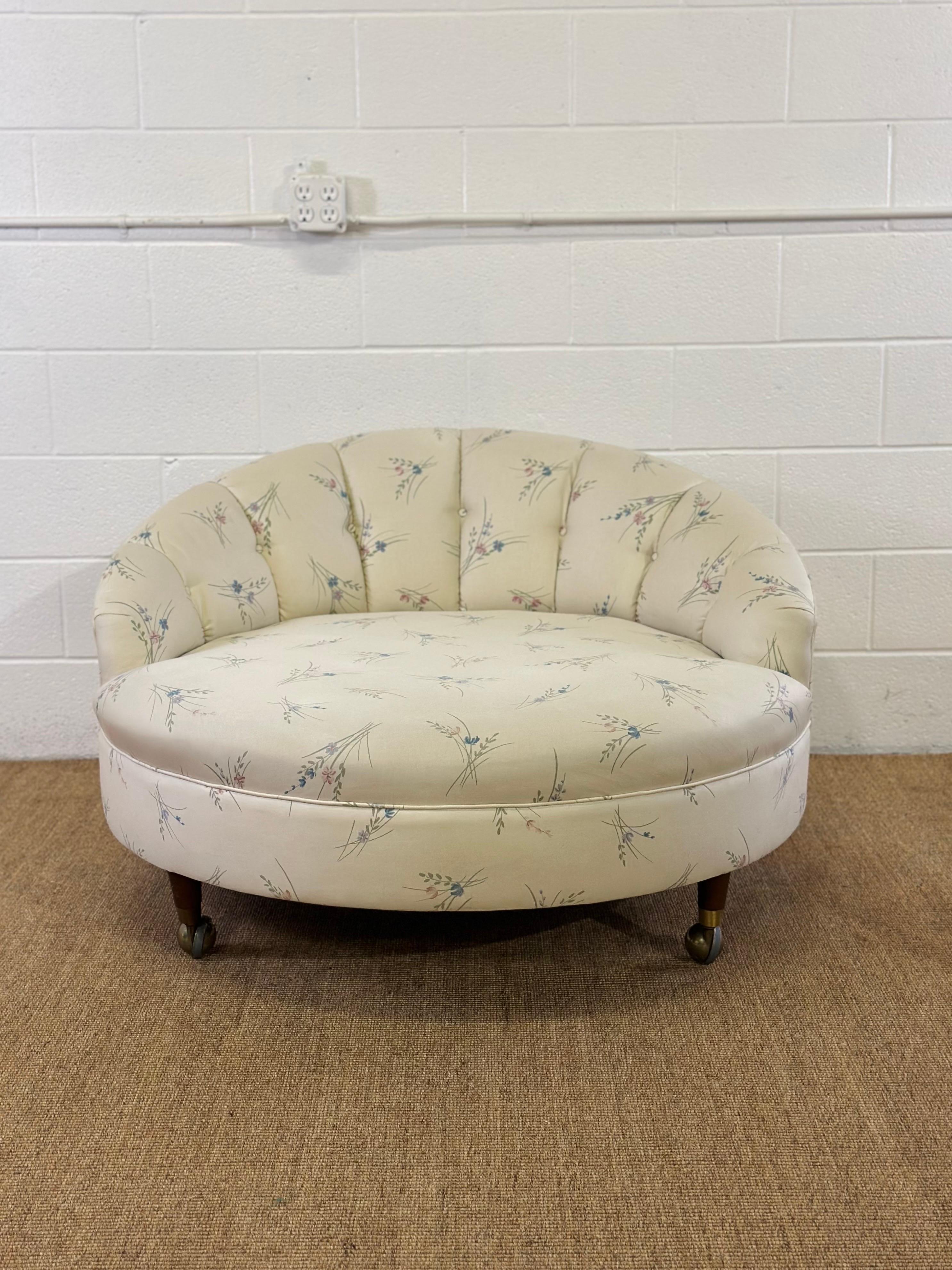 We are very pleased to offer a beautiful tub chair, circa the 1970s.  This exquisite piece stands out with its significantly oversized design and an alluring barrel back that merges sophistication with unparalleled comfort, making it a timeless