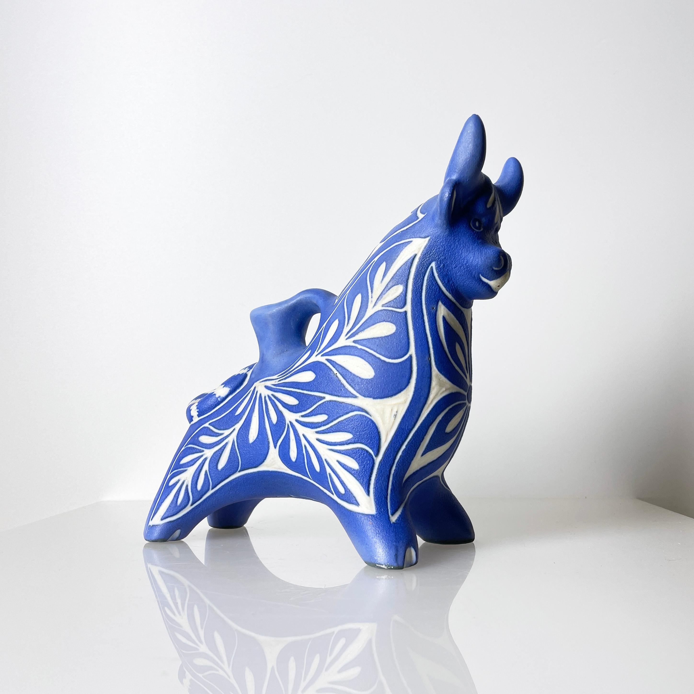 1970s Pablo Zabal Chile decorative porcelain bull. With insert for use as a candle holder. Signed on base: Pablo Zabal Chile. 
Diameter: ca. 28cm.  Height: 25cm. 
Beautiful eye catching azure blue decorative piece with distinctive pattern.  In