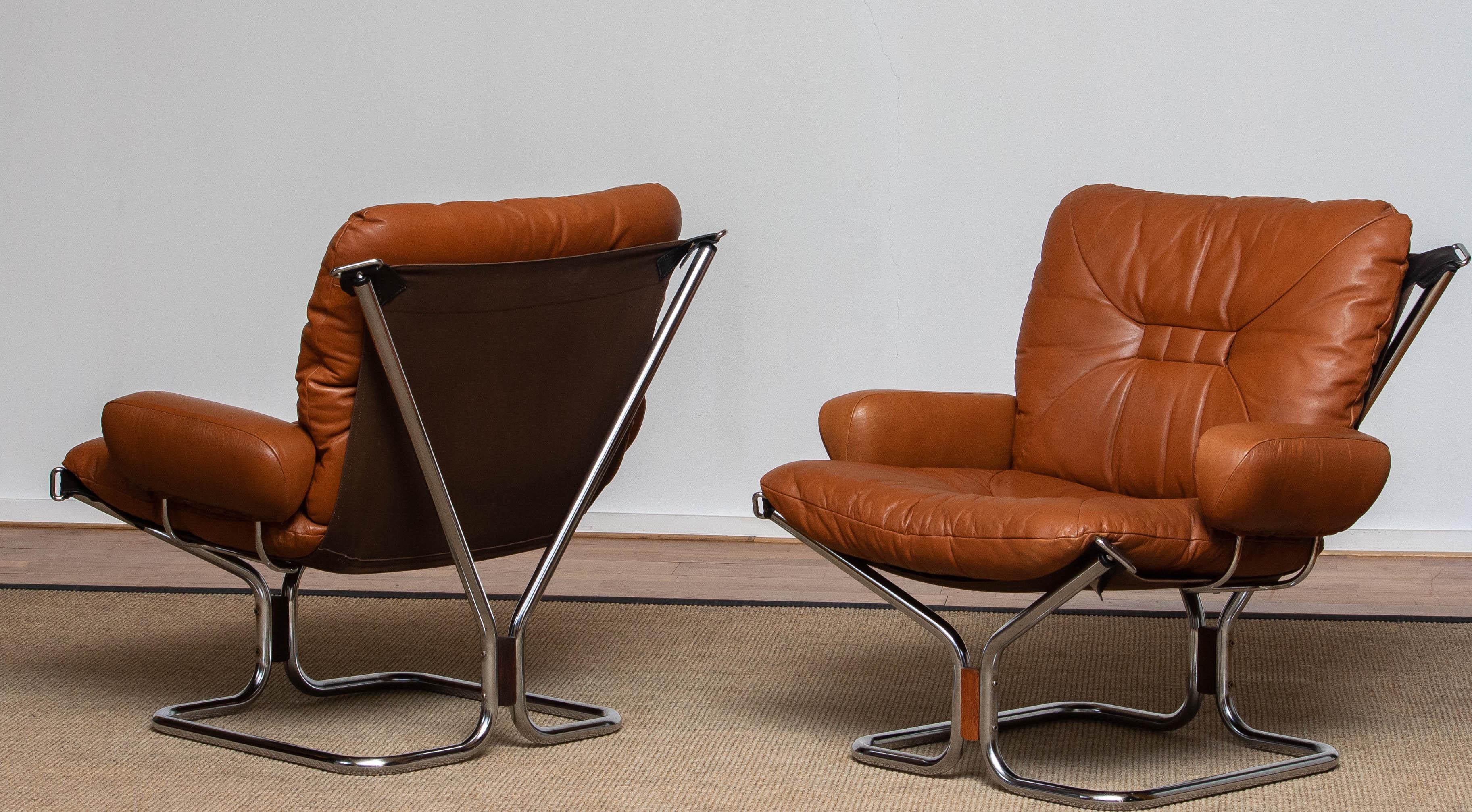 Late 20th Century 1970s Pair Lounge Chairs in Cognac Leather and Chrome by Harald Relling 