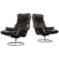 1970s Pair of Black Leather Swivel Chrome Steel Lounge Chairs, Sweden