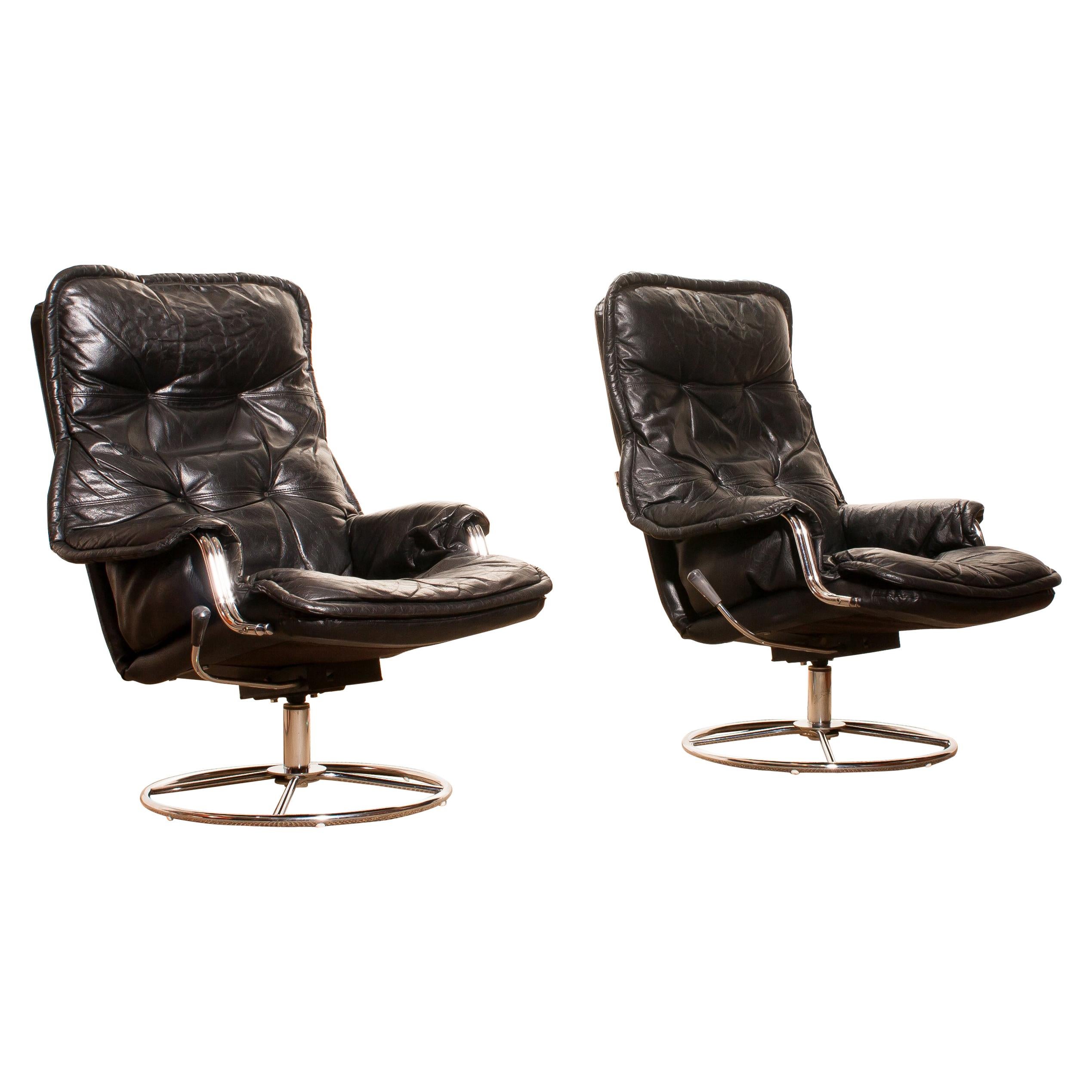 1970s Pair of Black Leather Swivel Chrome Steel Lounge Chairs, Sweden