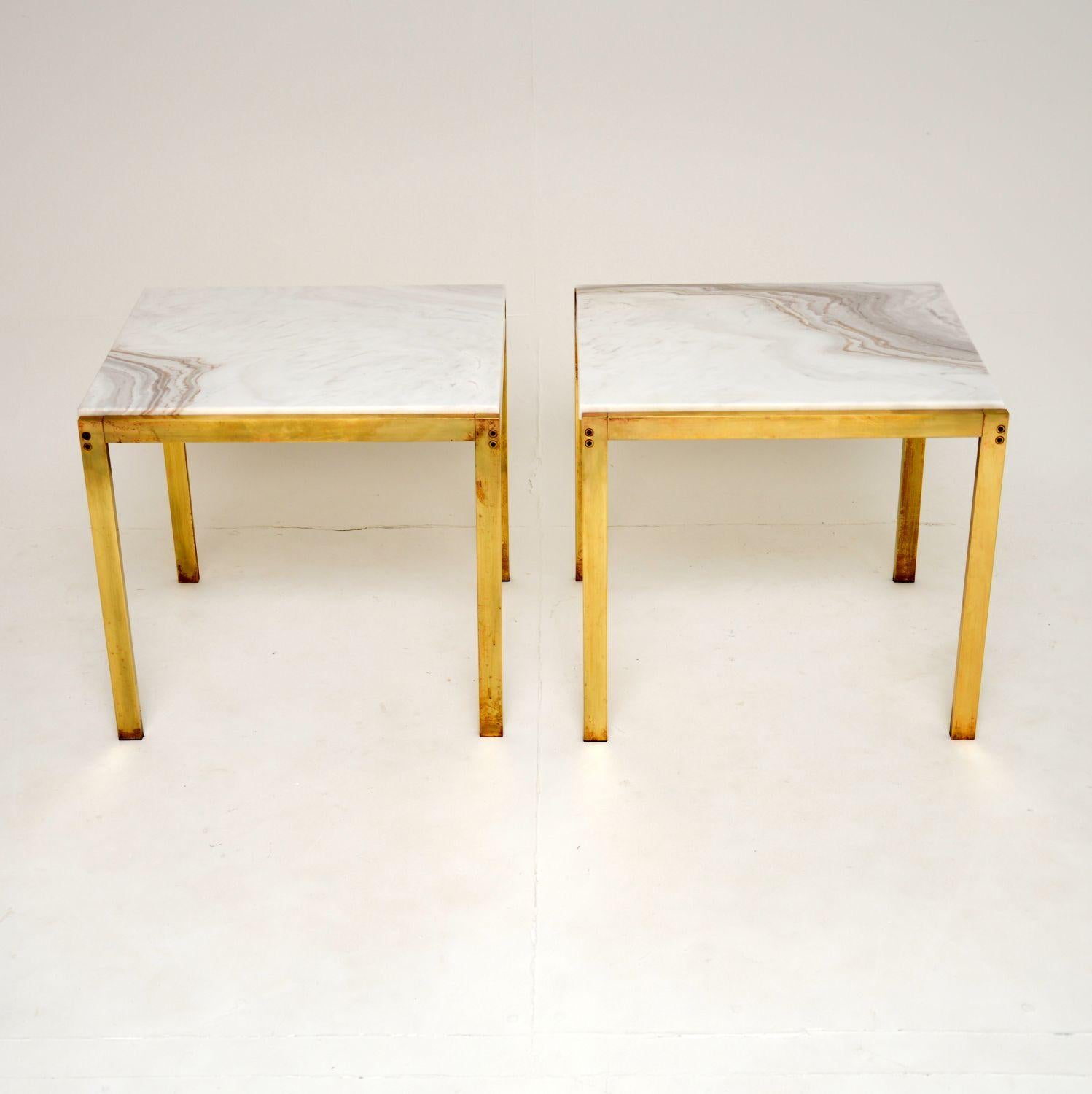 A stylish and beautifully made pair of vintage solid brass side tables with inset marble tops. These were likely made in Italy, they date from the 1970’s.

They are beautifully made, the frames have a lovely and elegant design. They are a great