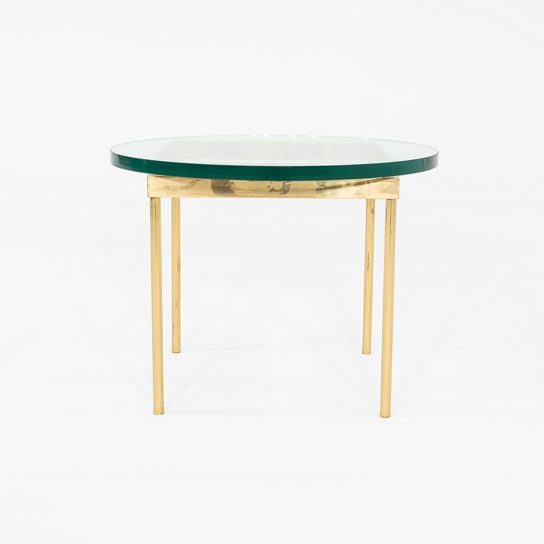 This is a pair of bronze and glass side tables, attributed to Ward Bennett. These particular pieces were produced in the 1970s. The listed price includes both tables to be sold together as a set. 
 
 Each table measures 24 inches in diameter and 18