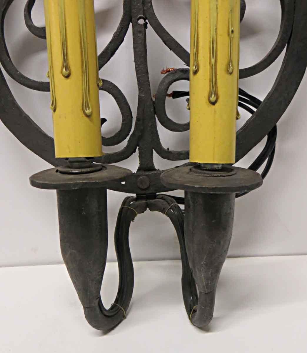 Late 20th Century 1970s Pair of Colonial Double Arm Wrought Iron Candlestick Sconces