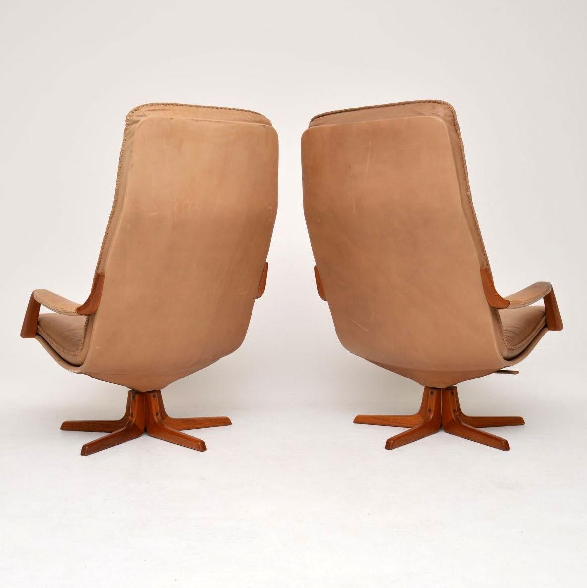 Late 20th Century 1970s Pair of Danish Leather and Teak Reclining Armchairs