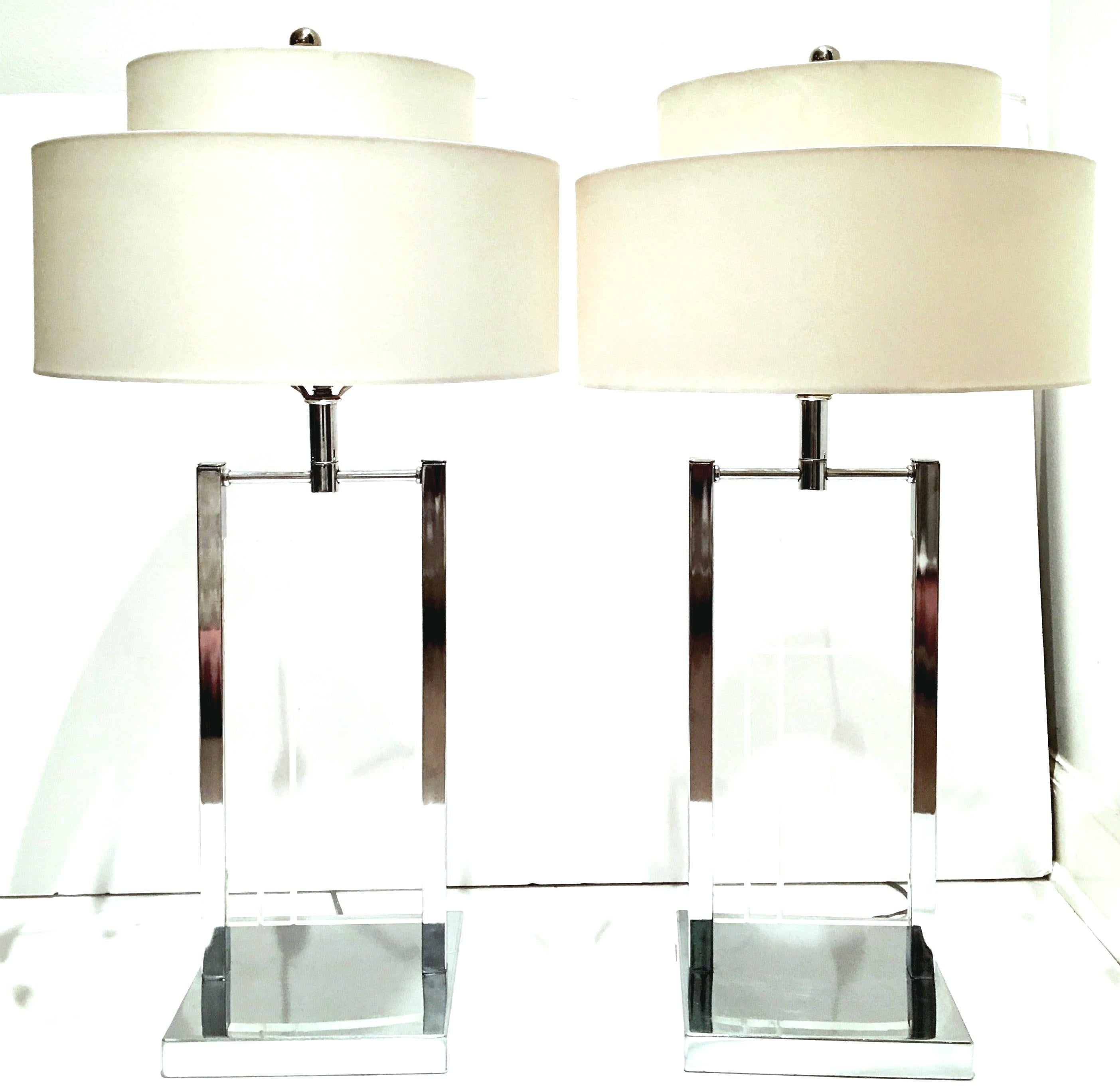 1970'S Pair OF Etched Lucite Panel & Chrome Table lamps By George Kovacs. Features a geometric clean line etched motif on Lucite slab panel with chrome fittings. The Lucite panel measures, 13