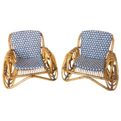 Coppia di poltrone in rattan e bambù in stile Franco Albini, anni '70, Italia
