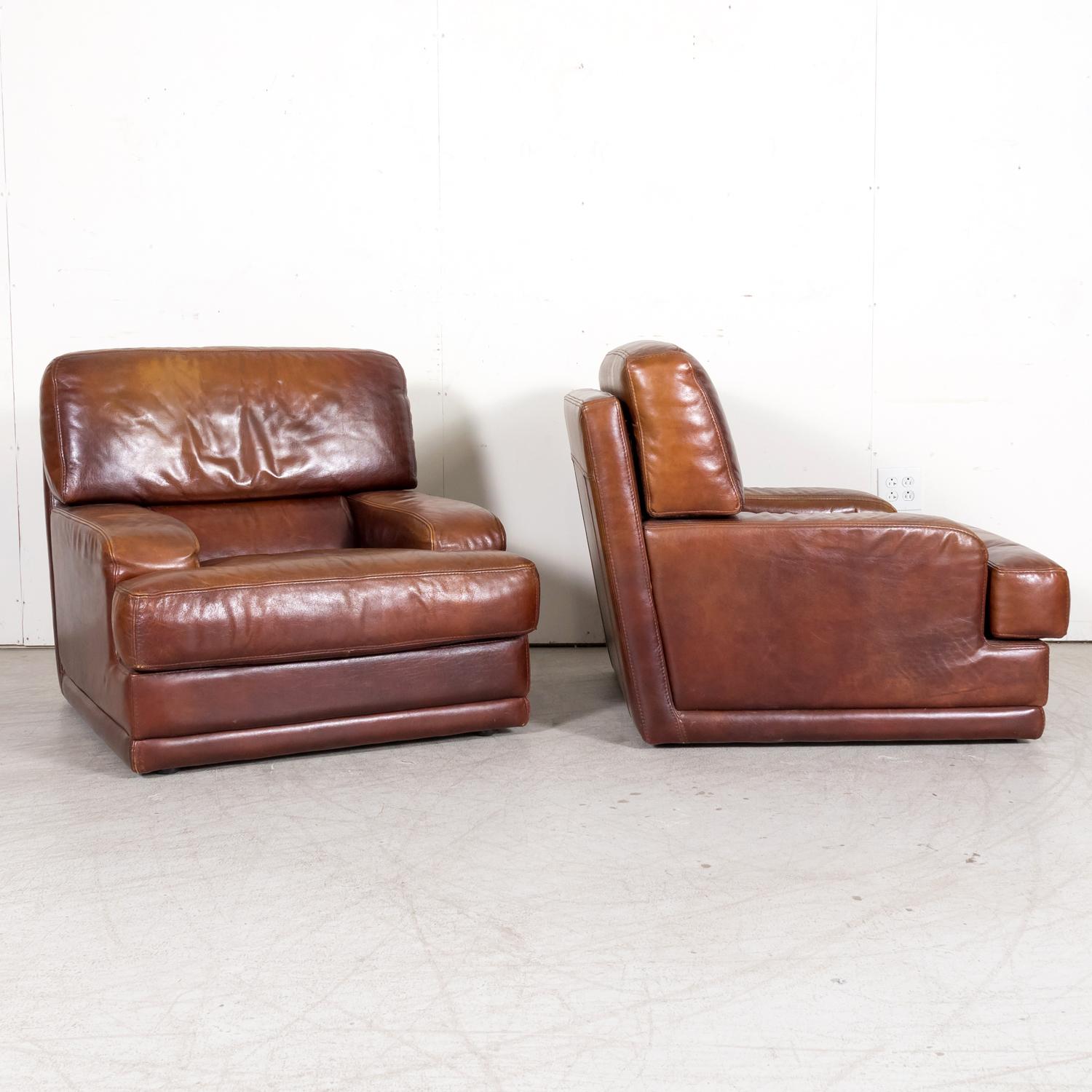 Late 20th Century 1970s Pair of French Mid-Century Modern Oversized Cognac Lounge Armchairs
