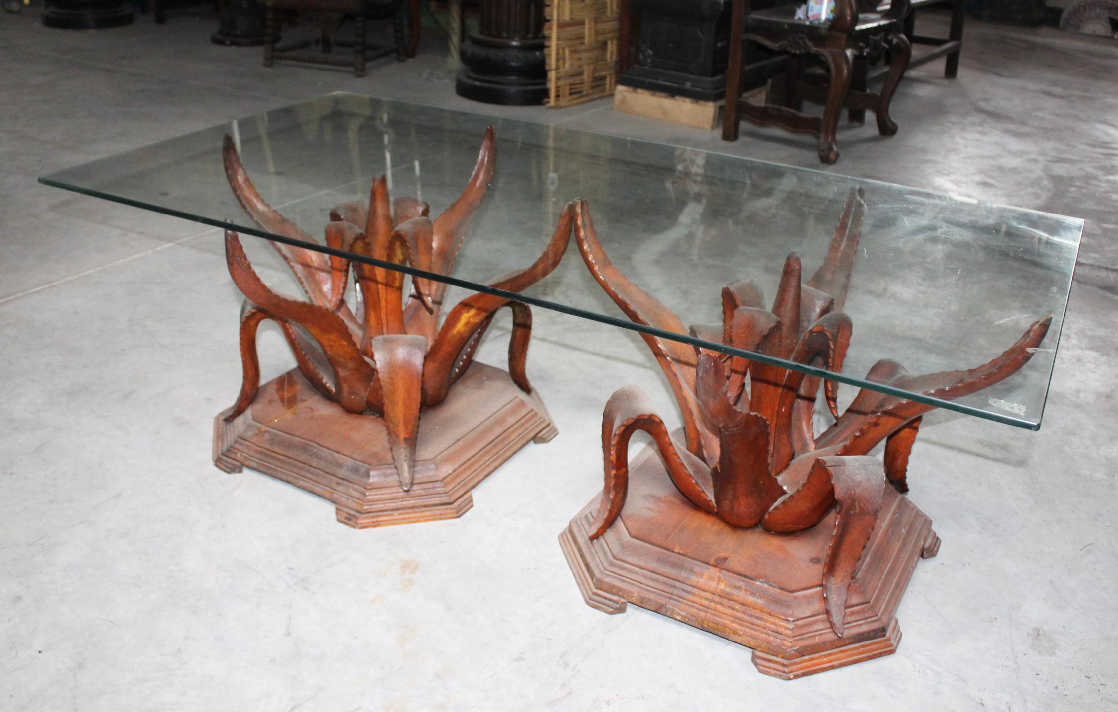 1970s pair of hand carved coffee table wooden bases in the shape of Aloe Vera cactus.

(price does not include glass top).

Measurement of each unit of table standing.
 