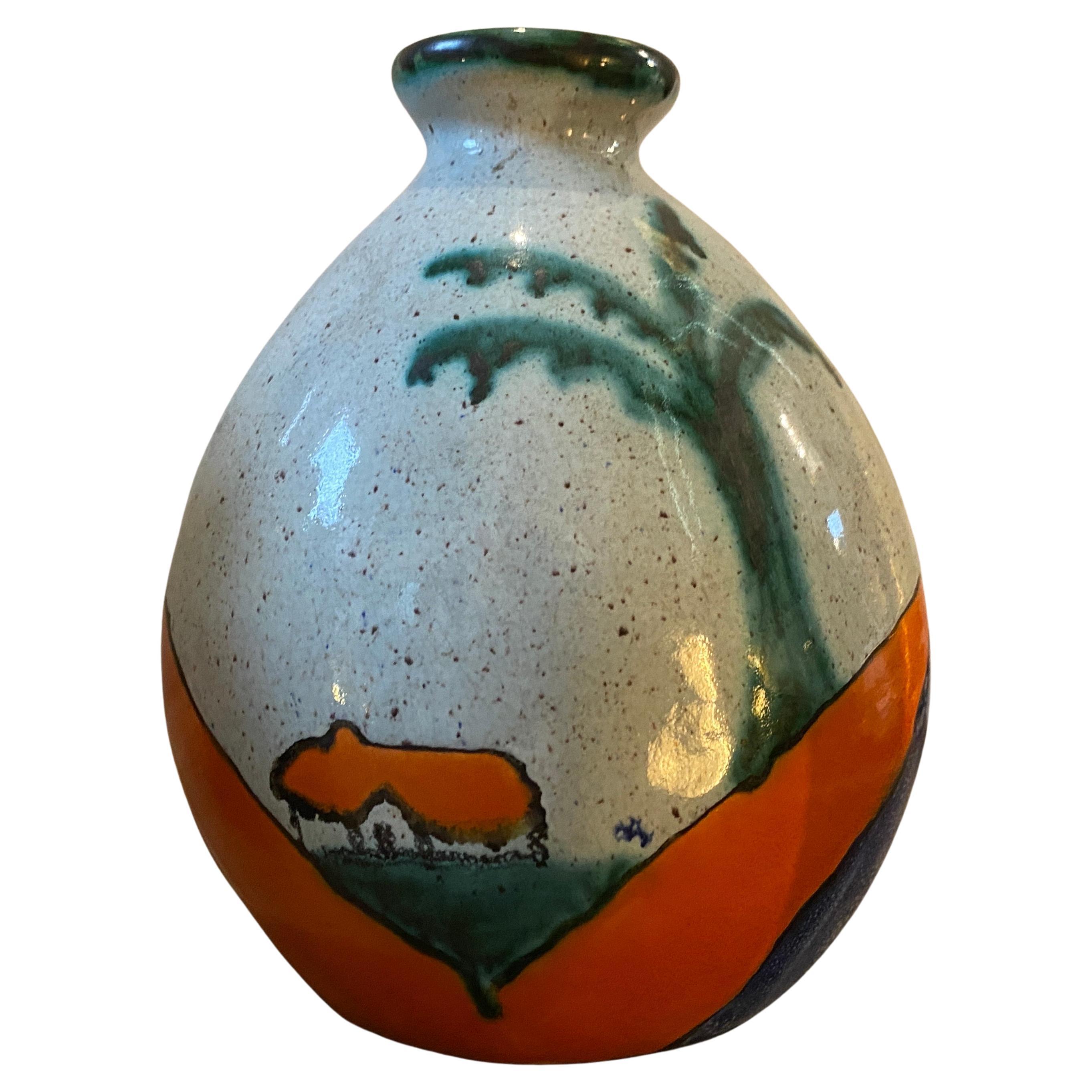 Cette paire de vases en céramique peints à la main par Ceramique de Bruxelles dans les années 1970 est un exemple étonnant du design moderne du milieu du siècle dernier. Ceramique de Bruxelles était une entreprise belge de céramique connue pour ses