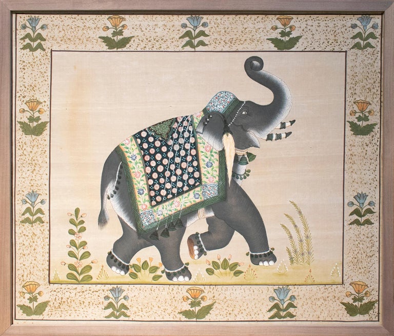 1970s pair of elephant paintings on silk.

Measures with frame: 46.5 x 54.5 x 4cm.