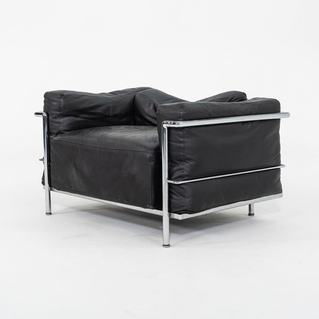 This is a pair of LC3 Fauteuil Grand Confort, Grand Modele Lounge Chairs, initially designed by Le Corbusier, Pierre Jeanneret, and Charlotte Perriand in 1928. These examples date to the 1970s and were produced in Italy by Cassina. The listed price