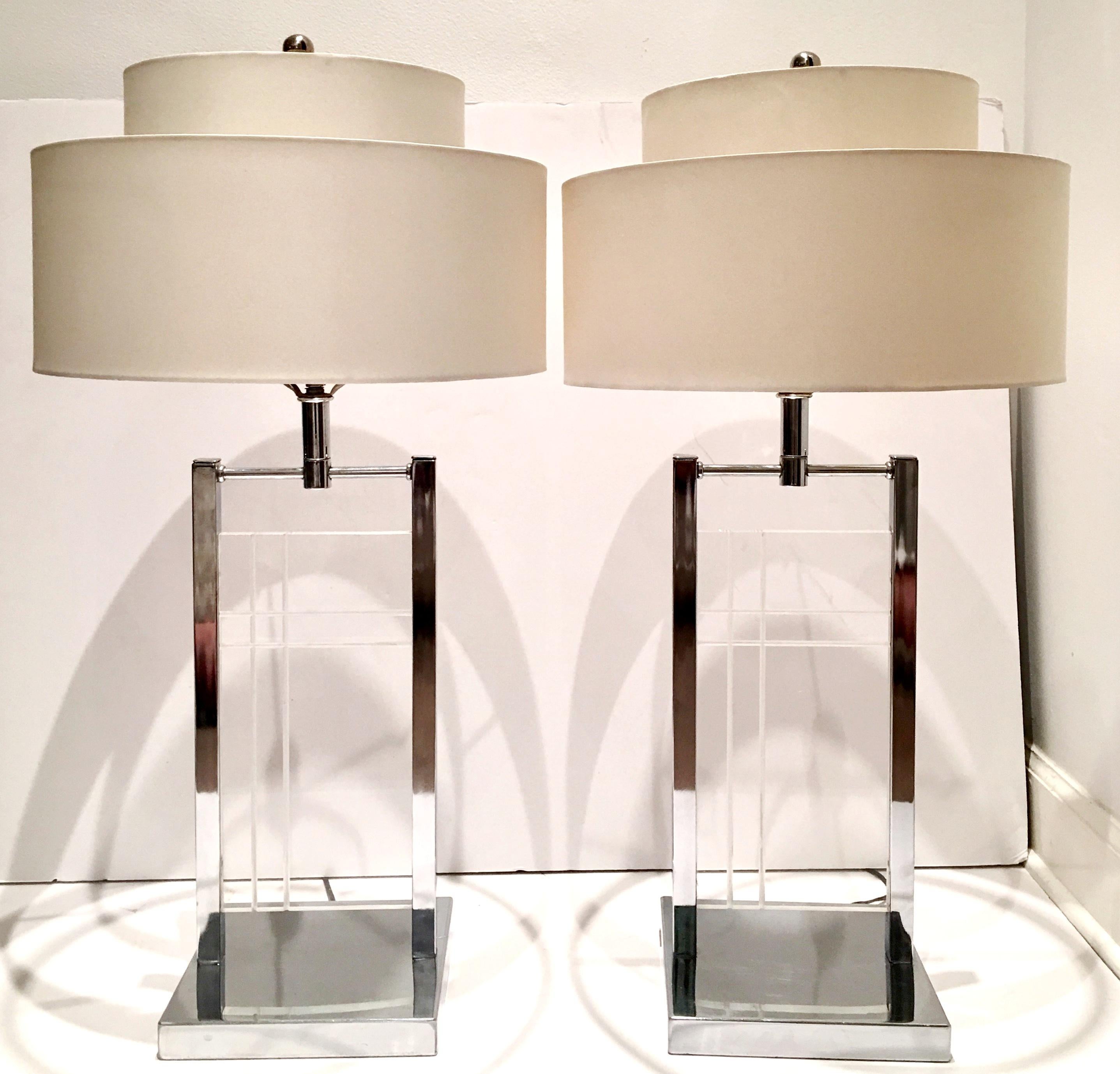 1970'S Modern & Timeless Etched Lucite Panel & Chrome Pair Of Lamps By, George Kovacs. Features a geometric clean line etched motif on Lucite slab panel with chrome fittings. The Lucite panel measures, 13