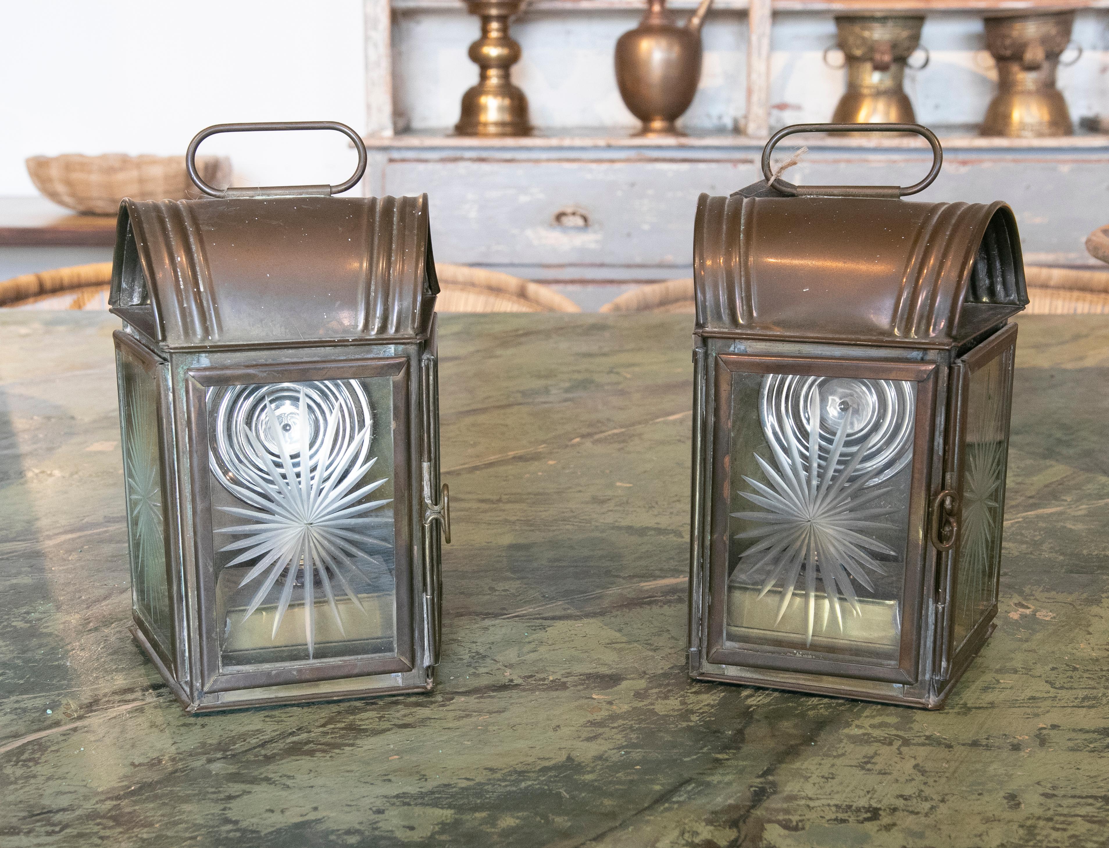 1970s pair of metal lanterns with carved crystals.