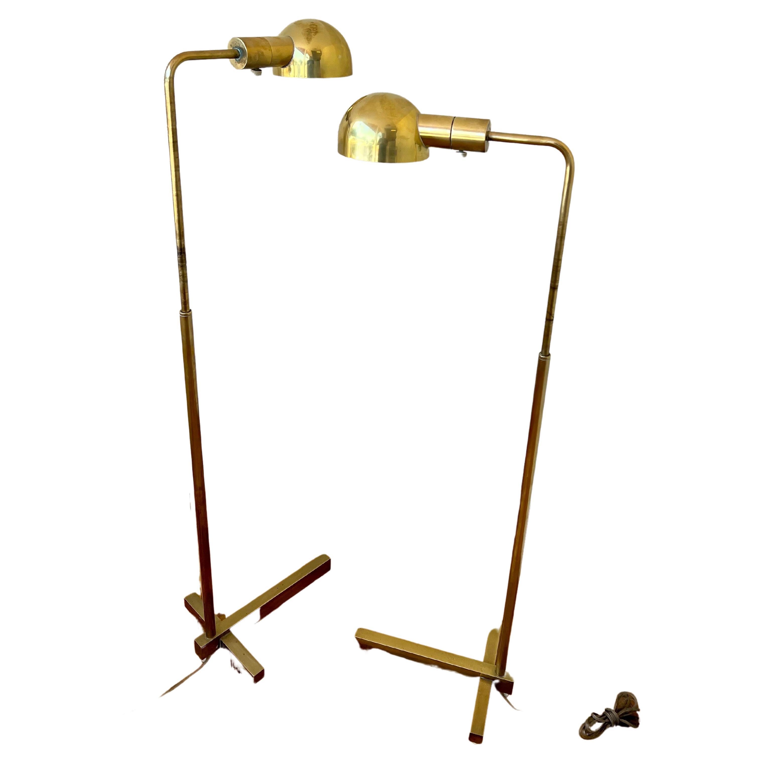 Great set of floor lamps by Casella lighting circa 1970s. in polished brass, with a dimmer switch, the shades rotate all the way also the pole rotates all the way and goes up and down, It reaches 51