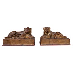 1970s Pair of Reclining Lion Sculptures in Patinated Metal on Rectangular Bases