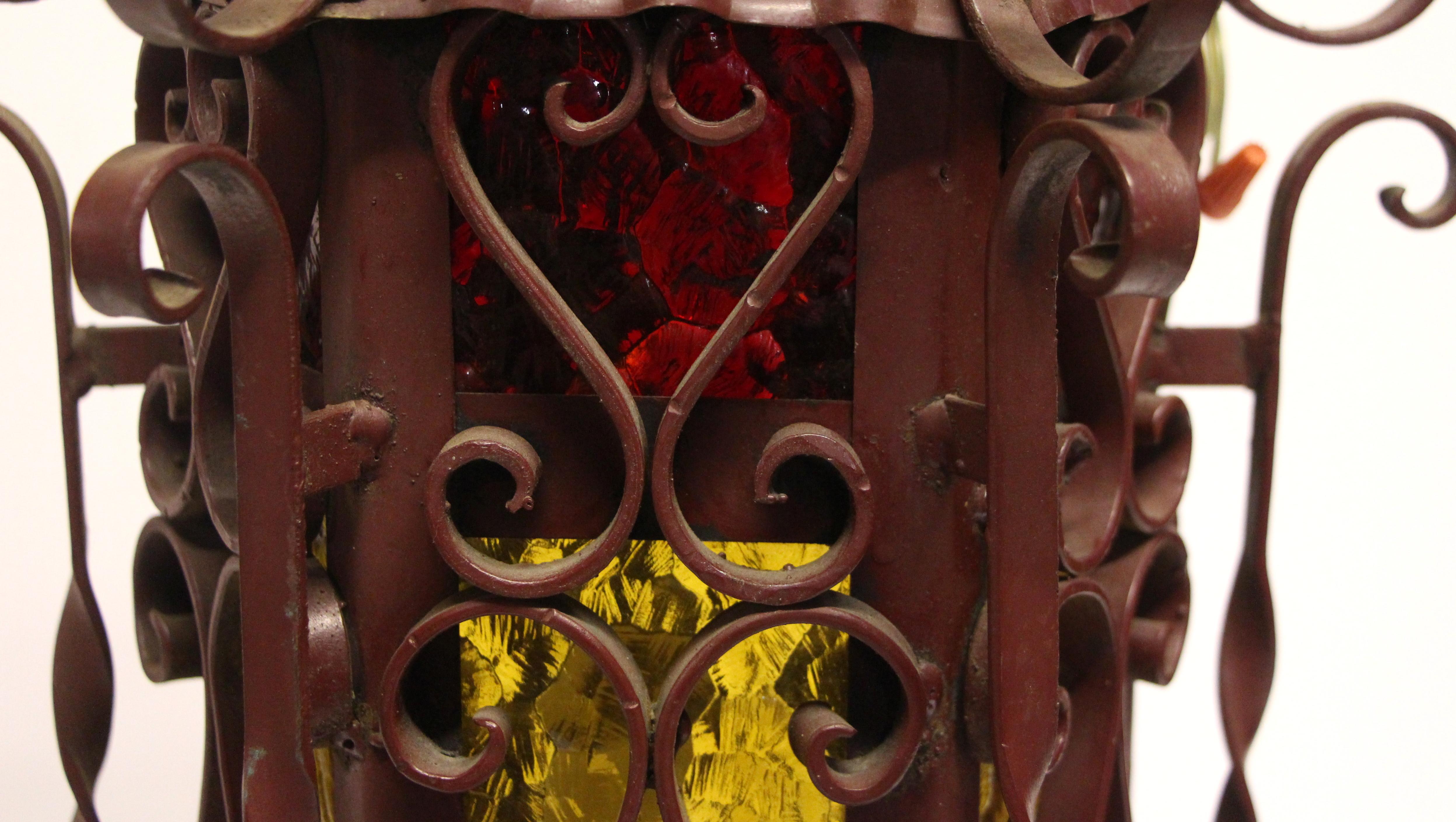 Late 20th Century 1970s Pair of Red Steel Lanterns with Amber Glass with Twist Details