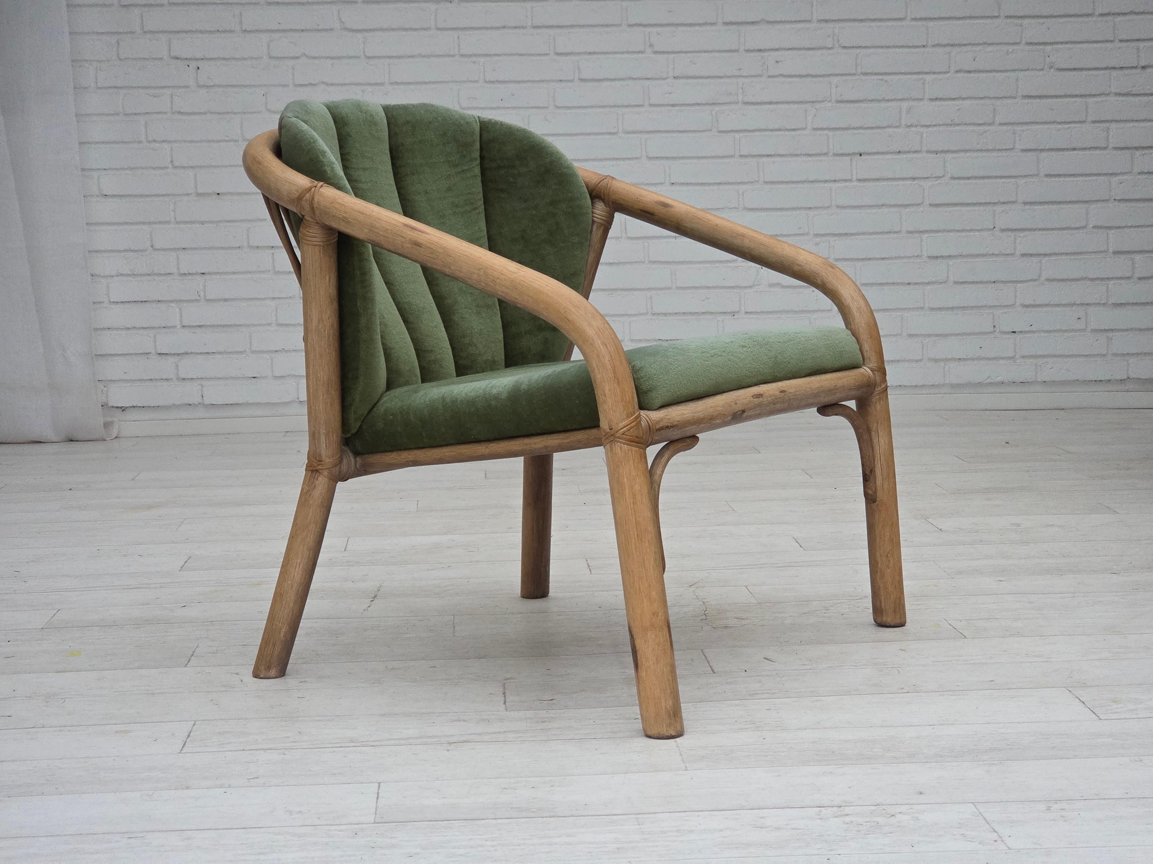 Danish 1970s, pair of Scandinavian lounge chairs, green furniture velour and rattan. For Sale