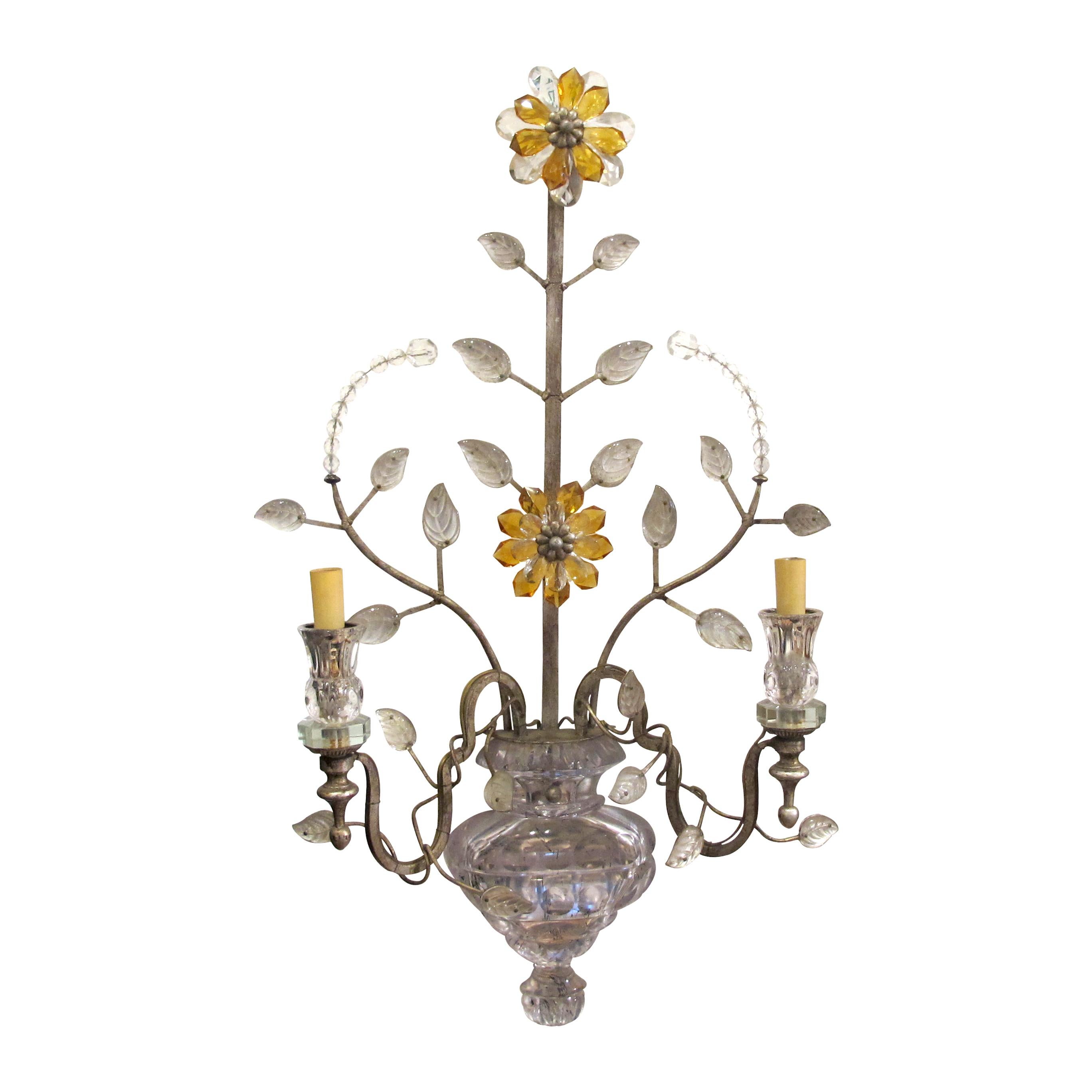 A very elegant and highly decorative pair of floral wall lights with two arms made by Banci of Firenze in the 1970s. The flowers are made of clear and amber crystals mounted on a silver-gilt frame in the shape of branches. 

Size: H67 cm x W40 cm x