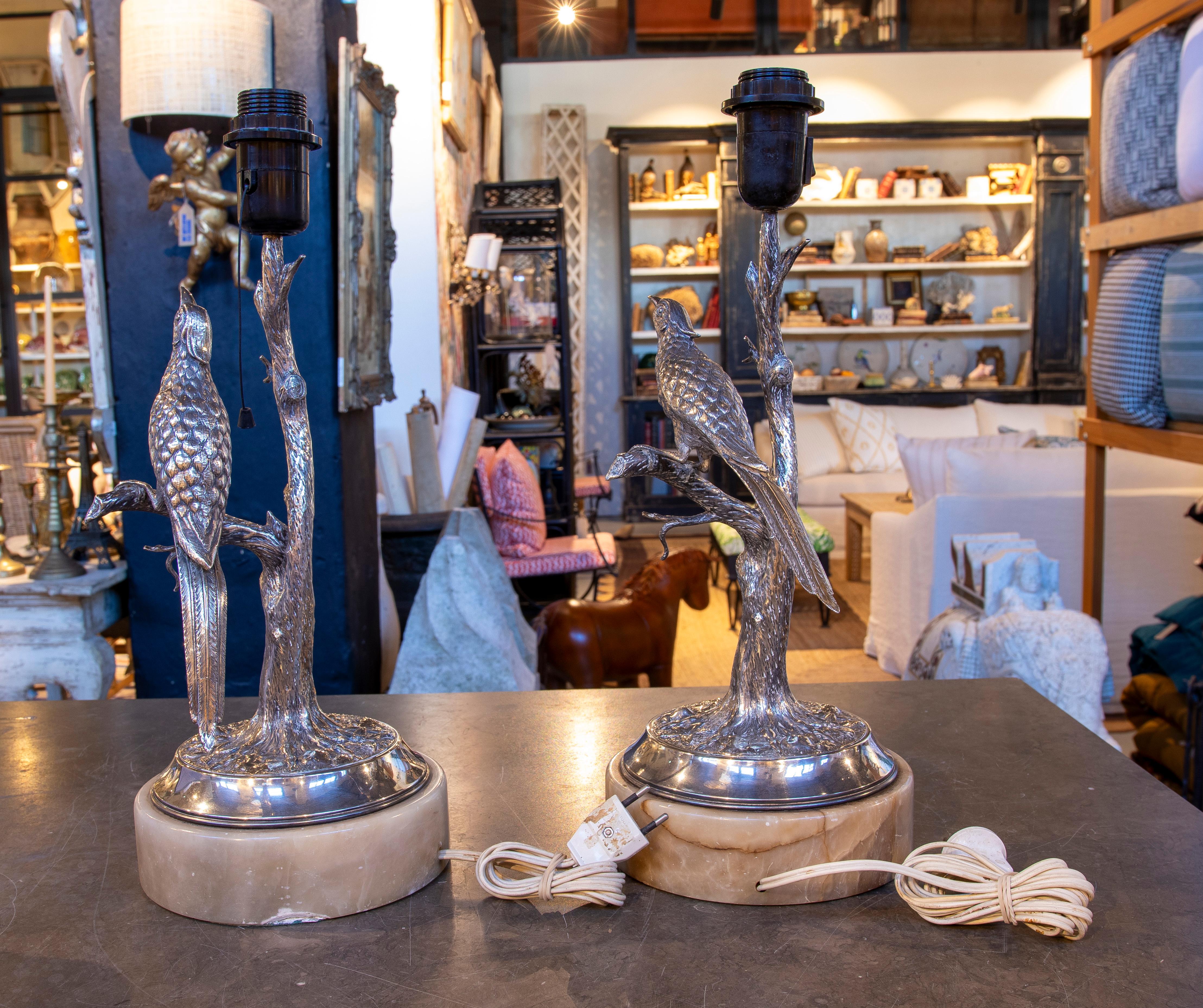 Spanish 1970s Pair of Silver Lamps with Embossed Birds. Silver weight: 1.5 kg.
