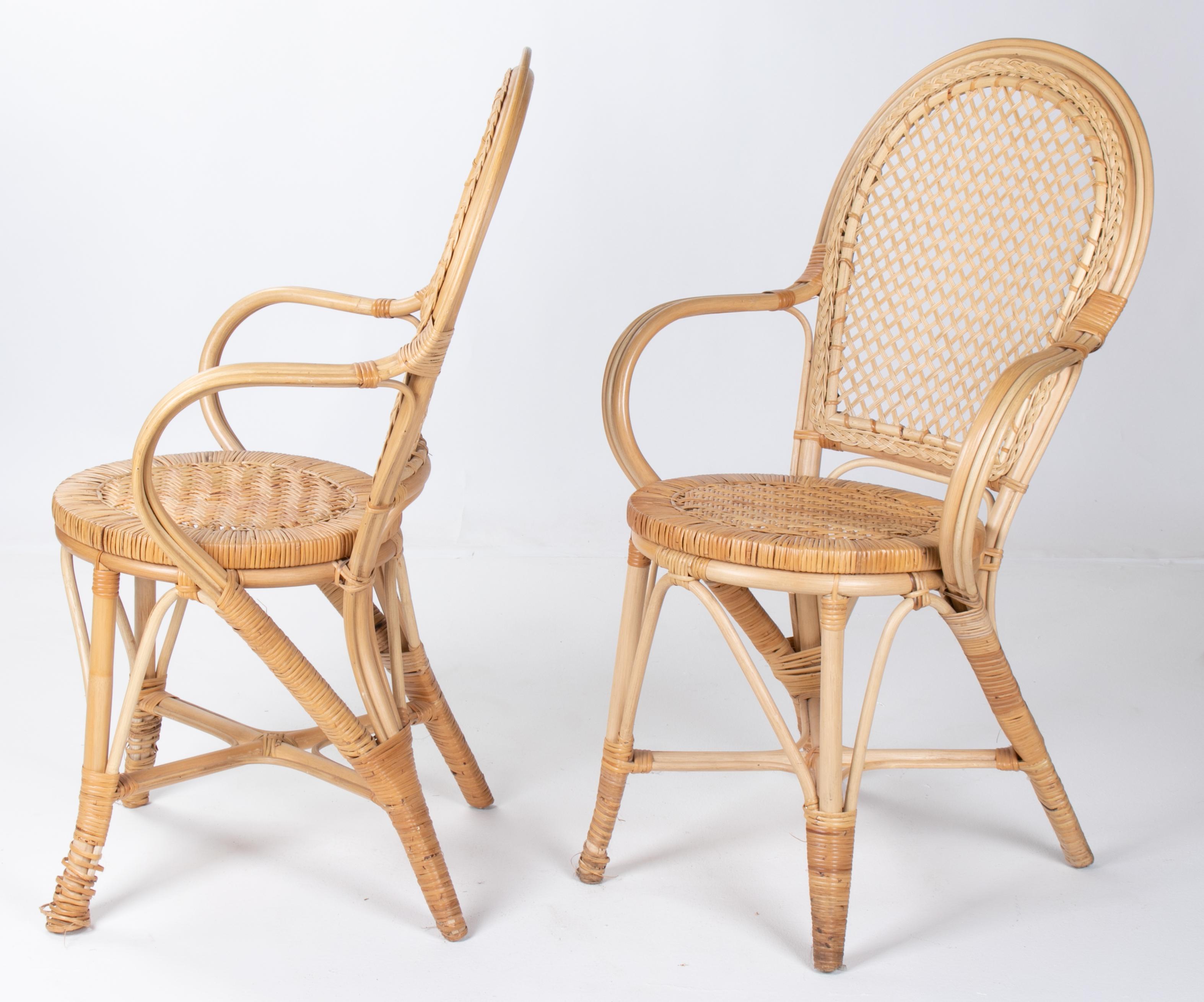 1970s pair of Spanish bamboo and wicker armchairs.