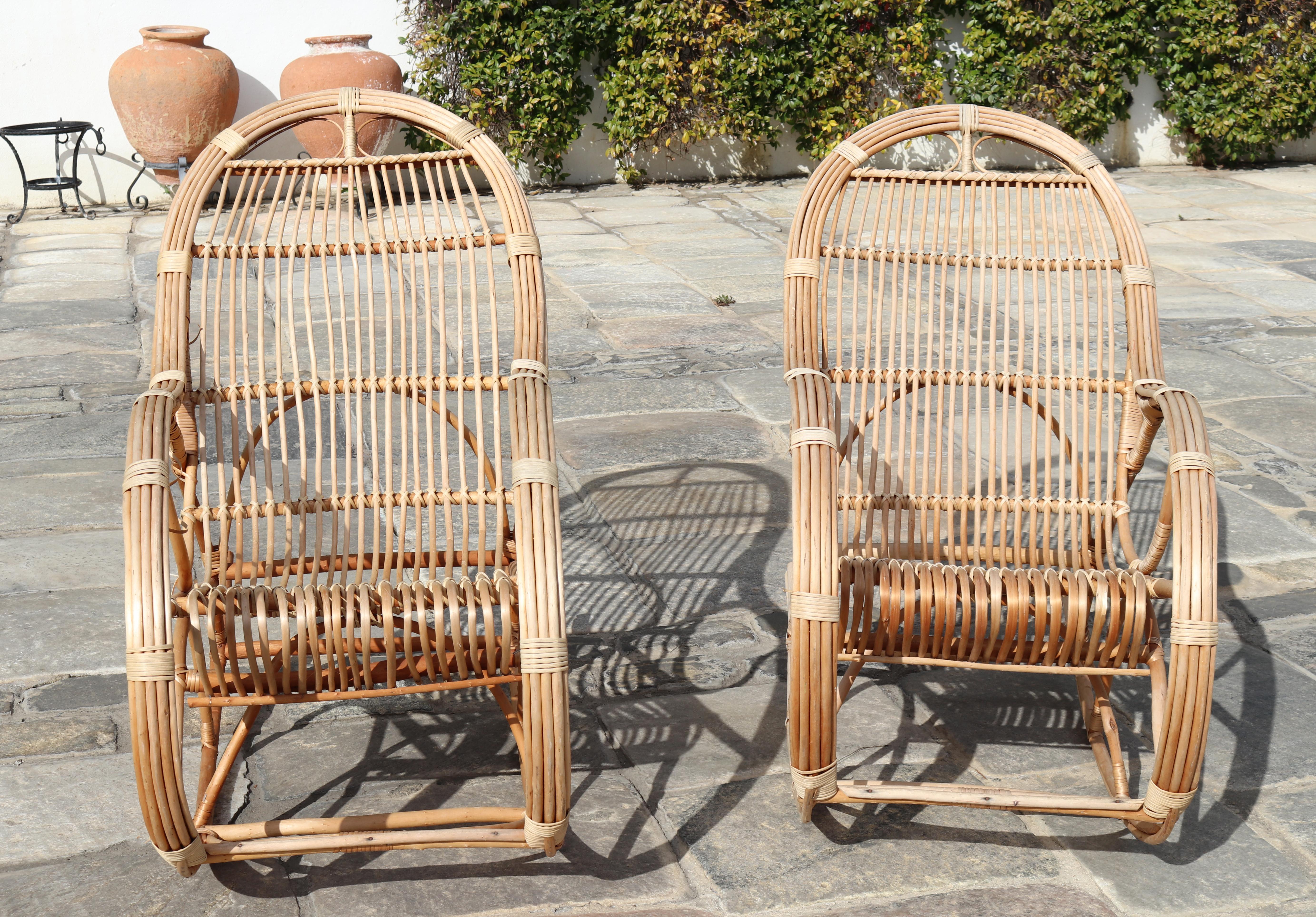 1970s pair of Spanish bamboo and willow wicker rocking chairs.