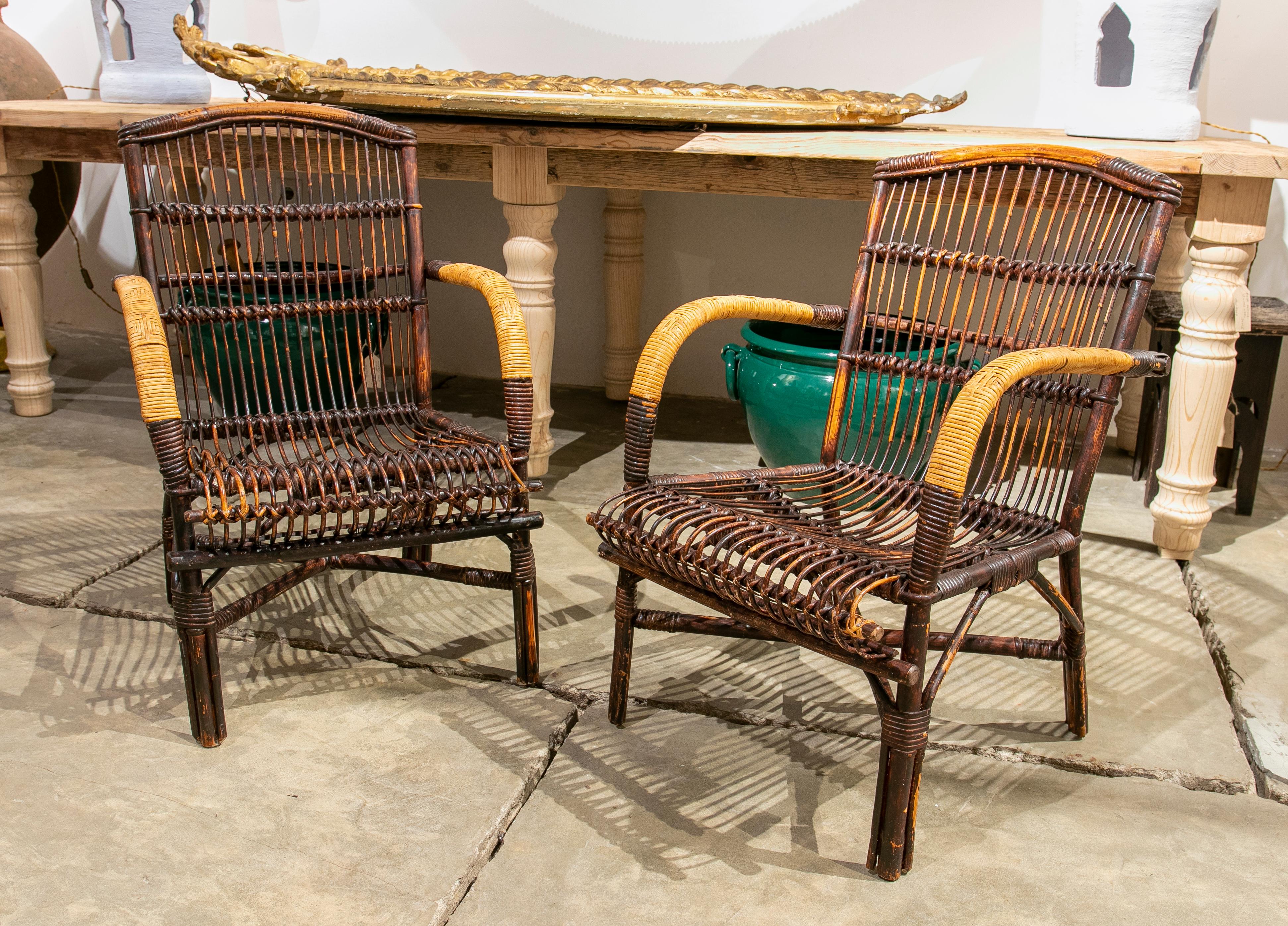 1970s Pair of Spanish bamboo armchairs.