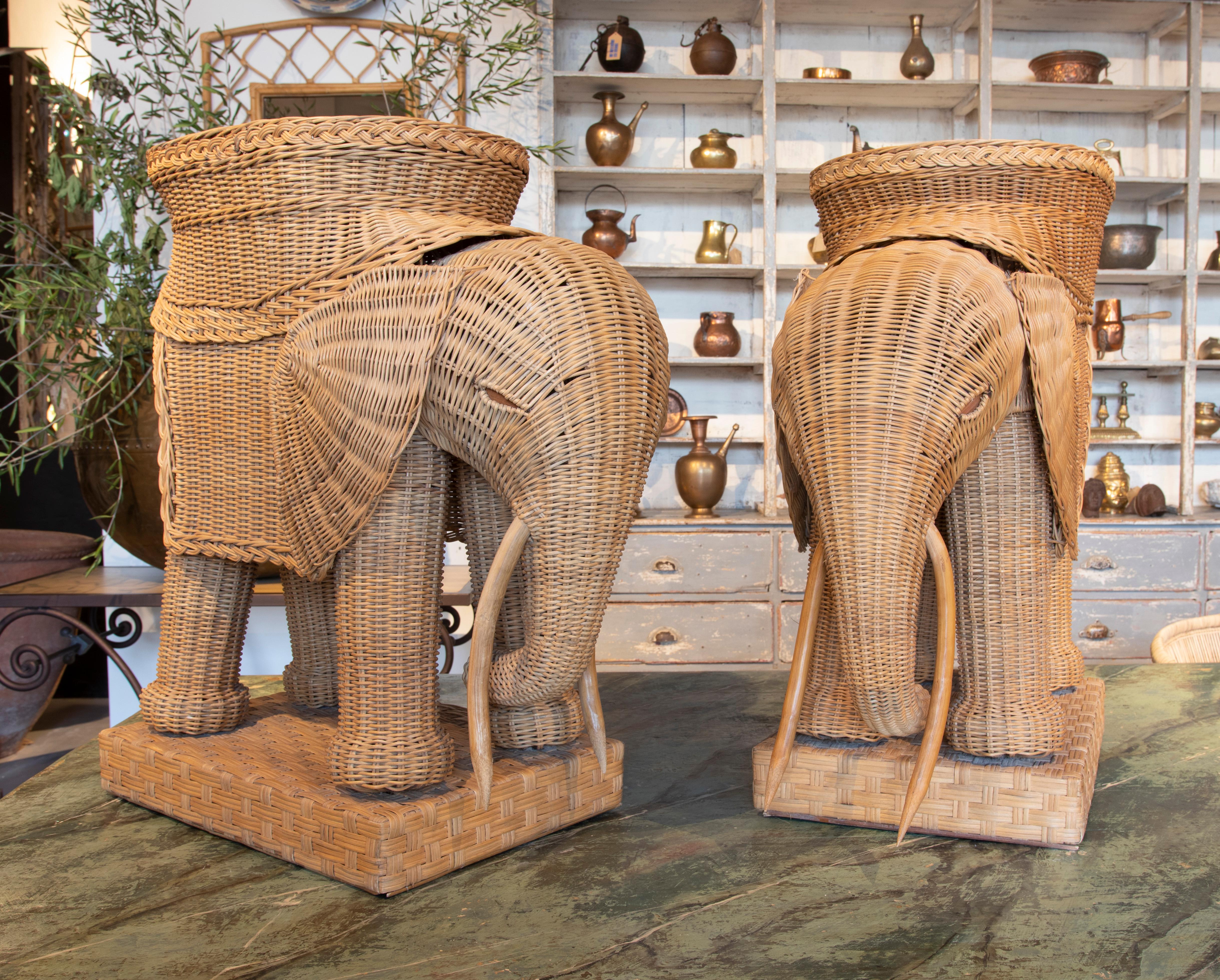 1970s pair of Spanish hand woven wicker elephant pedestal side tables.