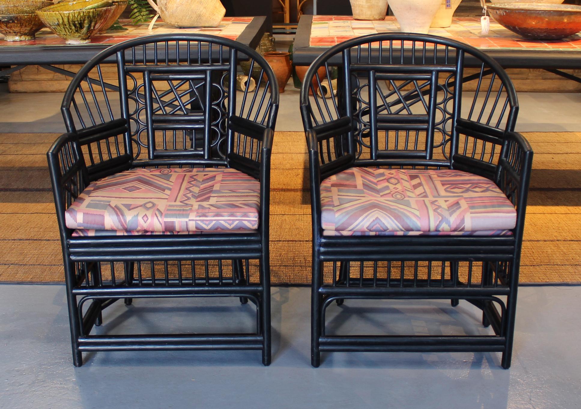 1970s pair of Spanish Orientalist style wood imitating cane bamboo armchairs.
 