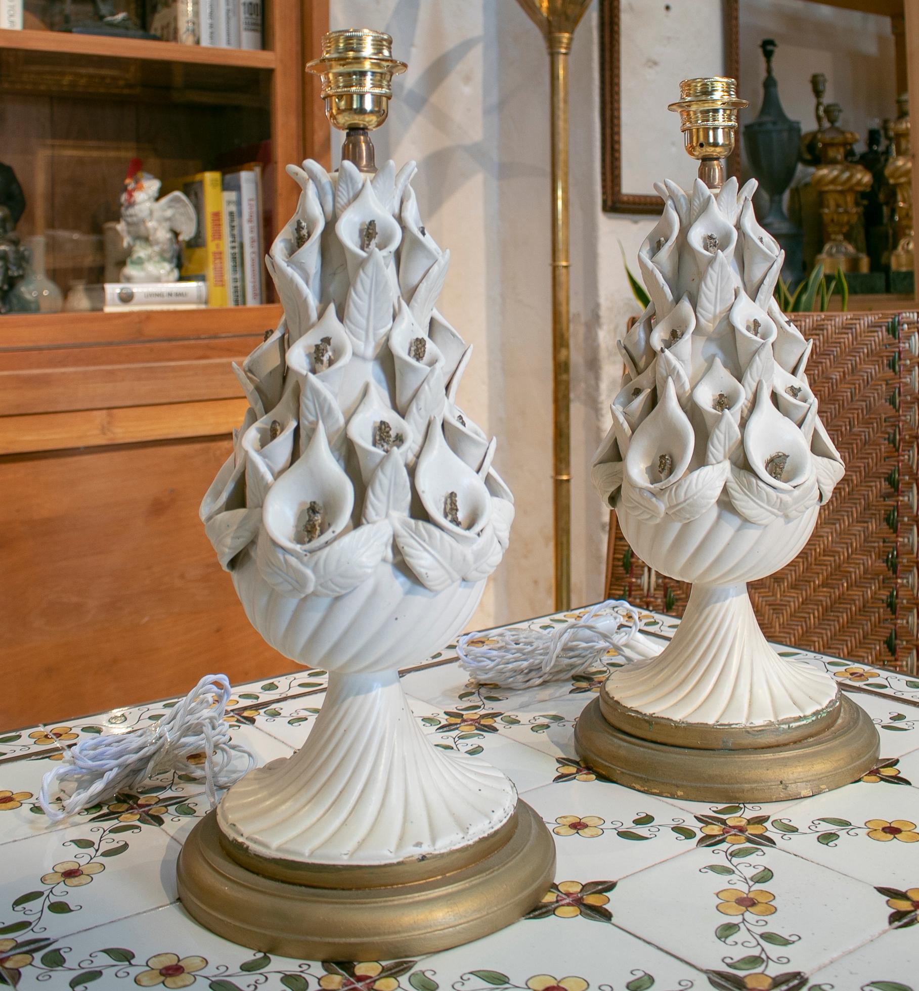 1970s pair of Spanish white porcelain table lamps.
