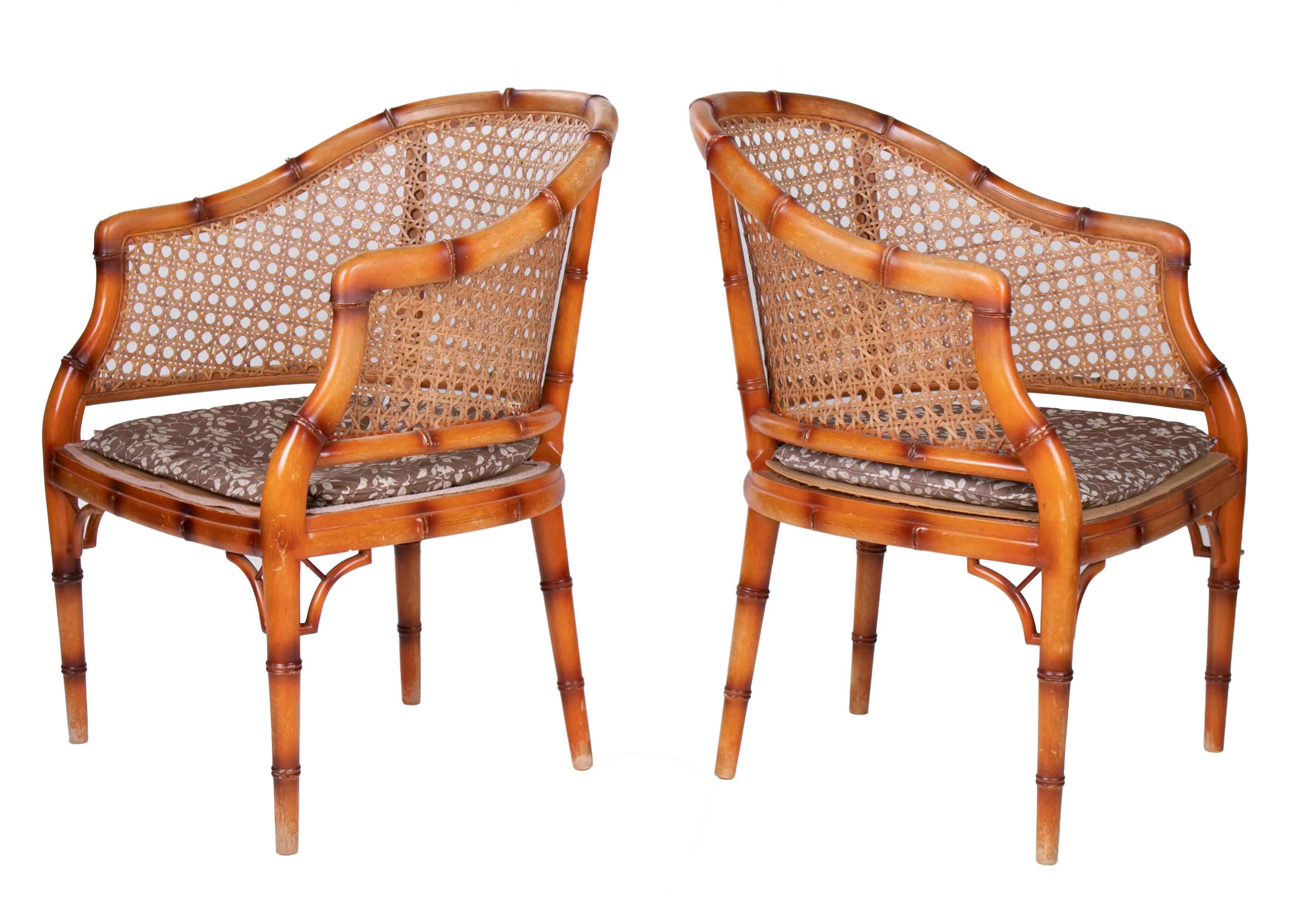 1970s pair of Spanish wooden armchairs imitating bamboo.