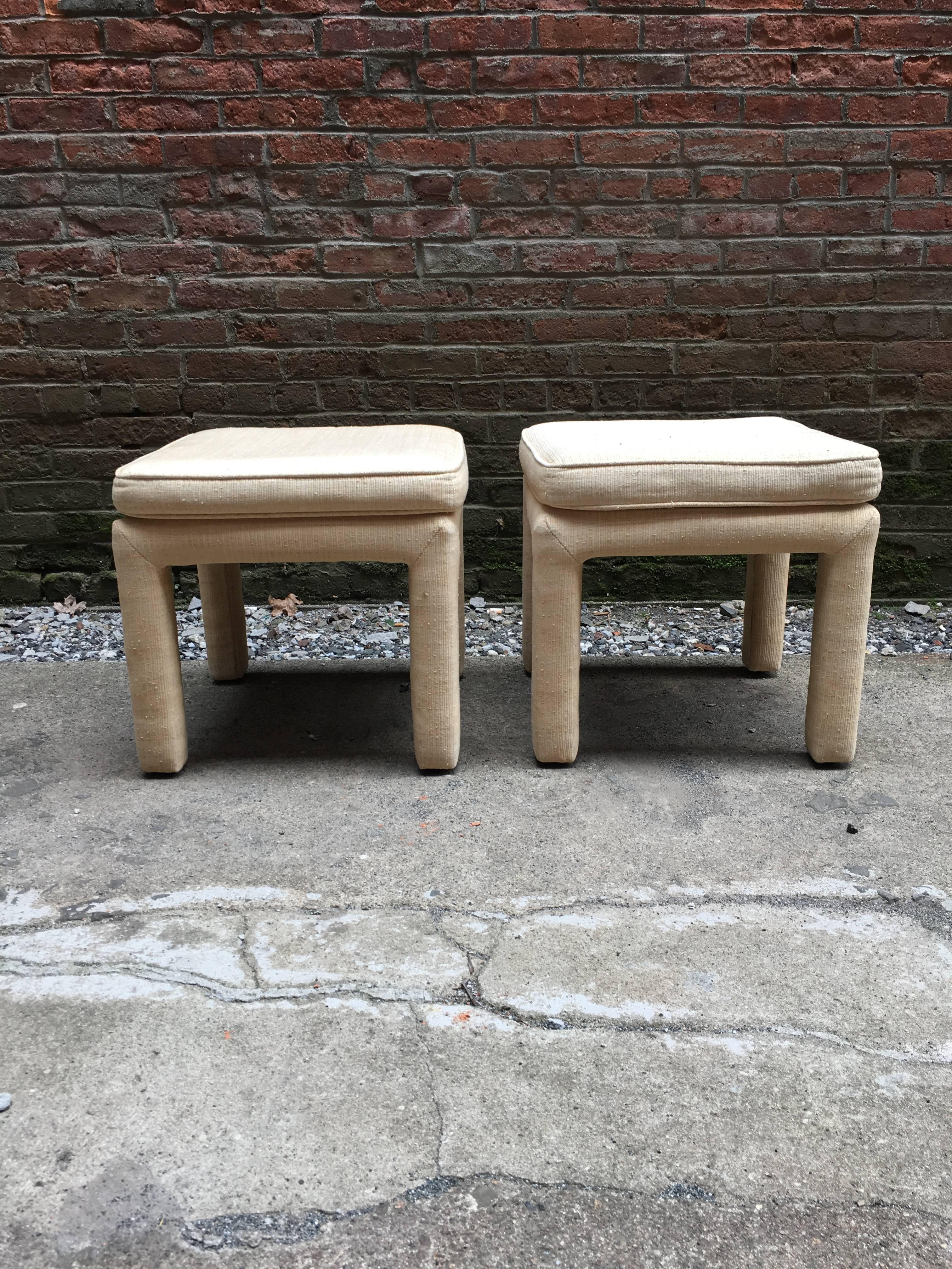 Pair of upholstered stools, circa 1970. Upholstered legs and seats. The pair needs to be recovered in any fabric you choose.

Measures: 18