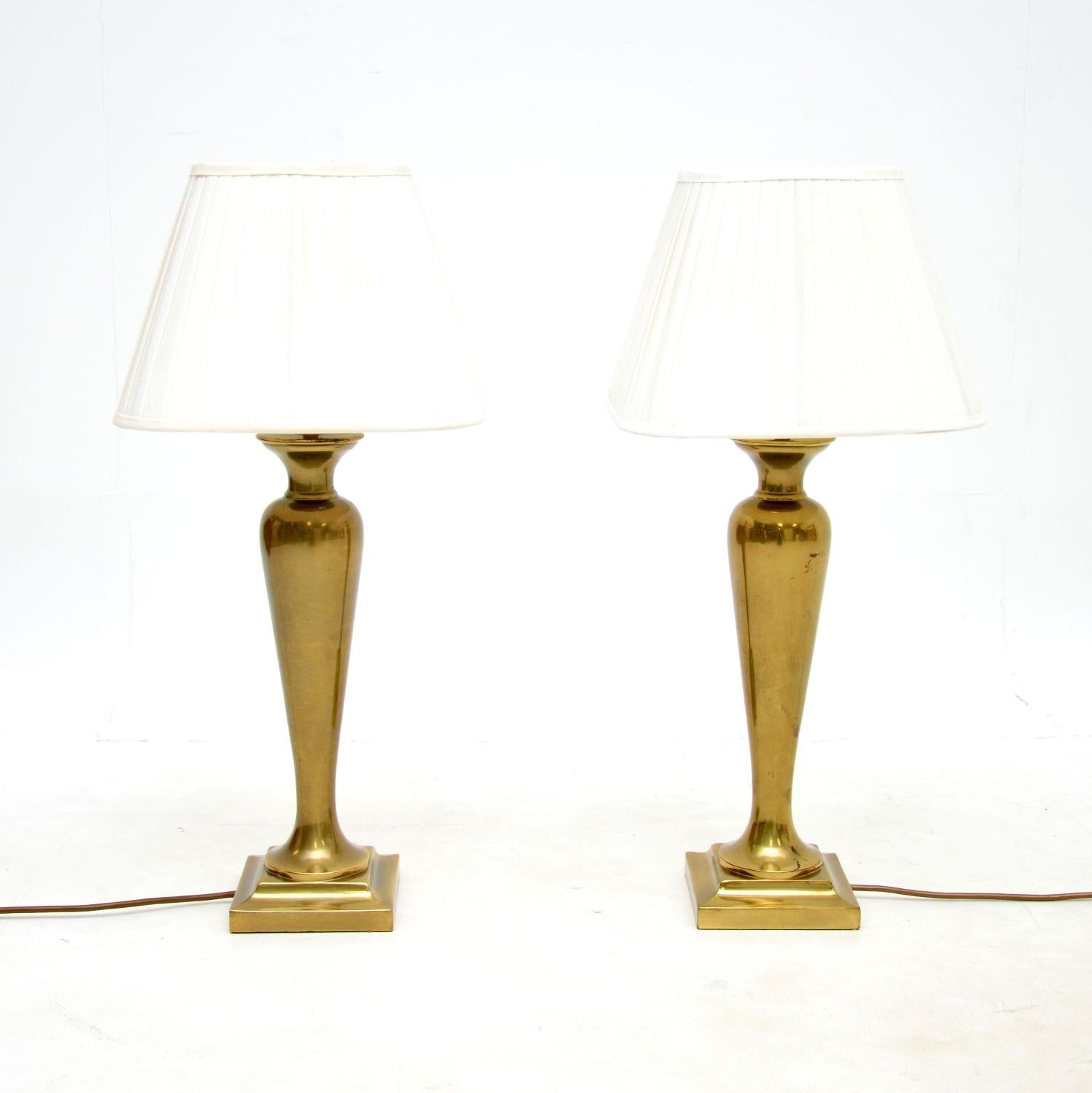 A stylish and very well made pair of vintage brass table lamps. They were made in England, they date from around the 1970’s.

They are of amazing quality and are a great size. The solid brass urn shaped stands have acquired a beautiful patina over