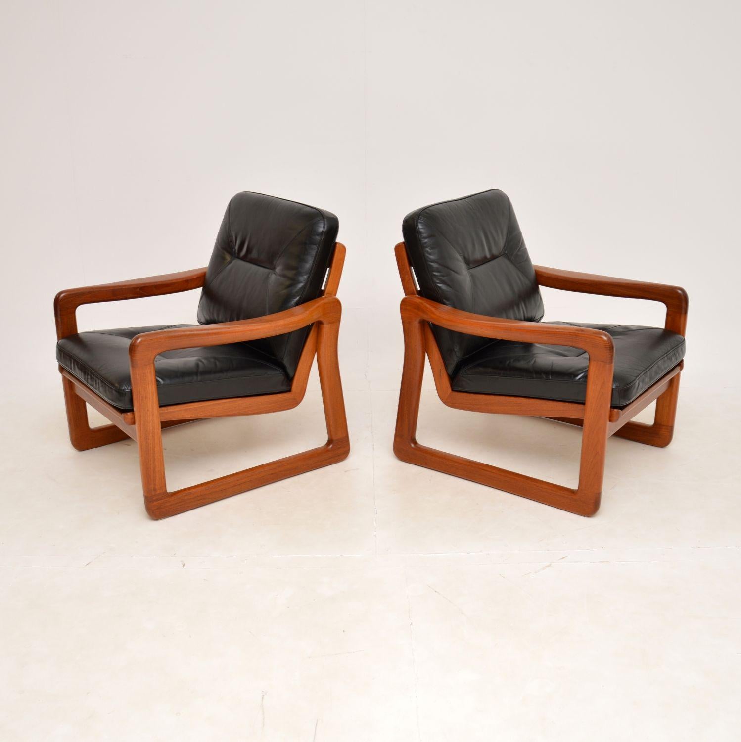 A very stylish and extremely comfortable pair of vintage Danish armchairs in teak and leather. They were recently imported from Denmark, they date from around the 1970s.

The quality is outstanding, the solid teak frames are very sturdy, with