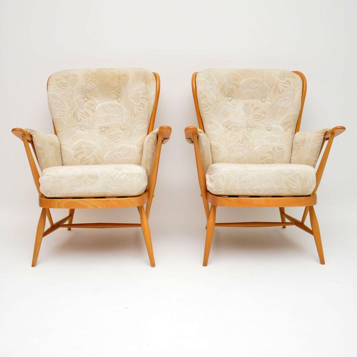A top quality and extremely comfortable pair of armchairs in solid Elm, these were made by Ercol and they date from around the 1970-80’s. They are so well made and in excellent condition for their age, the frames are all very clean, sturdy and